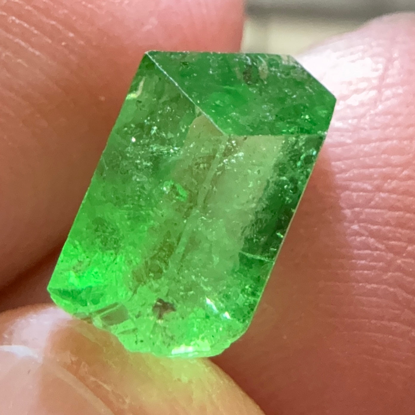 Tsavorite Garnet Crystal, 3.65ct A very unusual Tsavorite crystal from Merelani in Tanzania, Untreated Unheated, see the photos taken in different lights