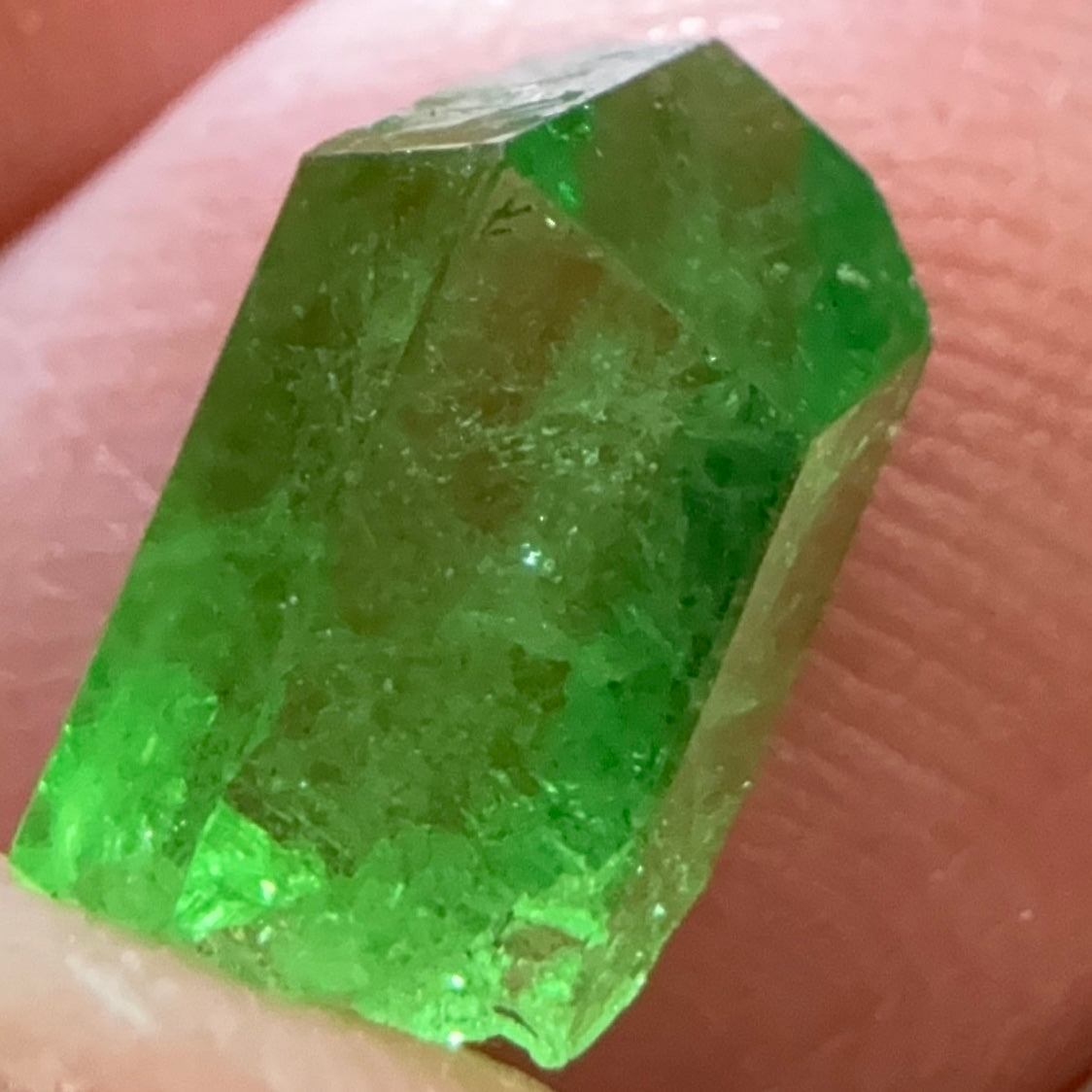Tsavorite Garnet Crystal, 3.65ct A very unusual Tsavorite crystal from Merelani in Tanzania, Untreated Unheated, see the photos taken in different lights