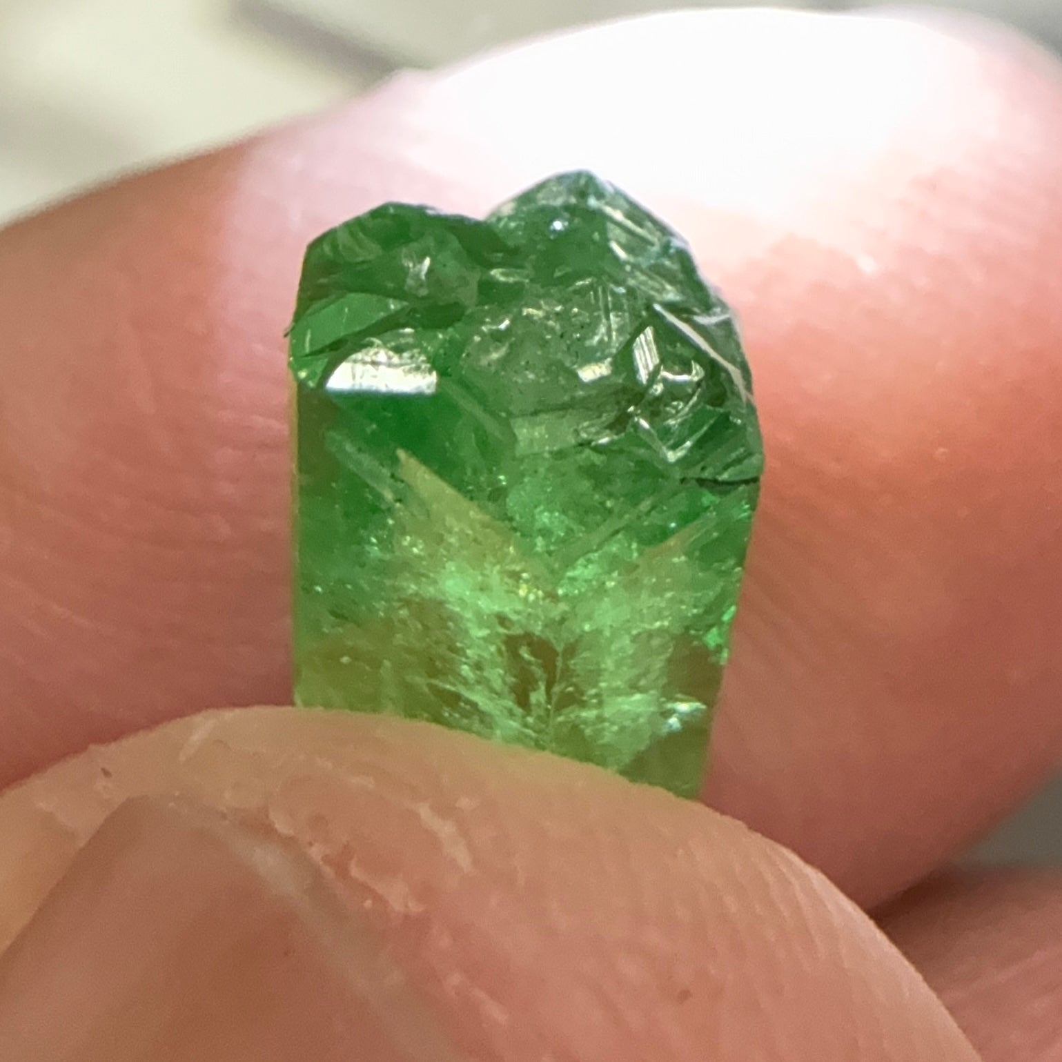 Tsavorite Garnet Crystal, 3.65ct A very unusual Tsavorite crystal from Merelani in Tanzania, Untreated Unheated, see the photos taken in different lights
