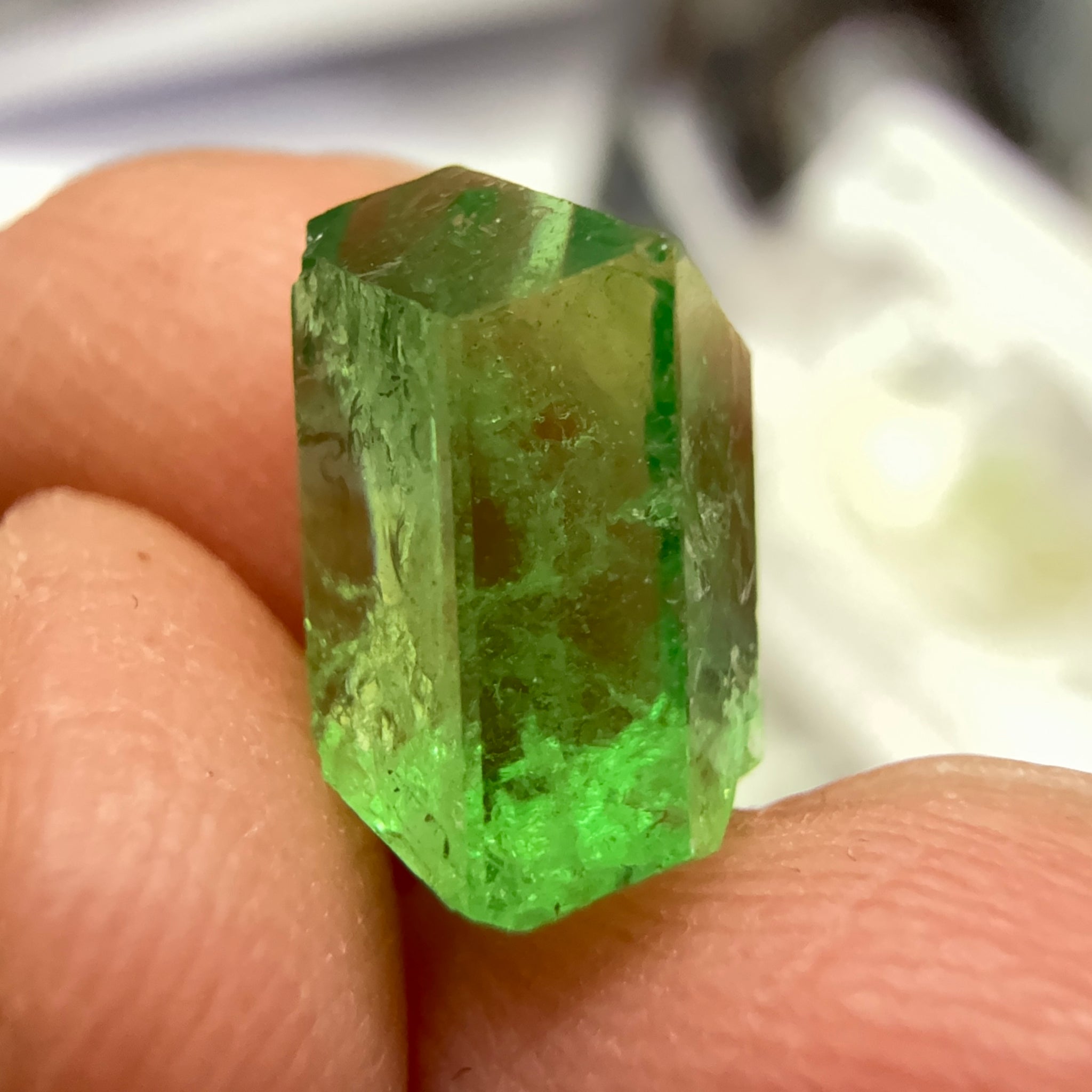 Tsavorite Garnet Crystal, 3.65ct A very unusual Tsavorite crystal from Merelani in Tanzania, Untreated Unheated, see the photos taken in different lights