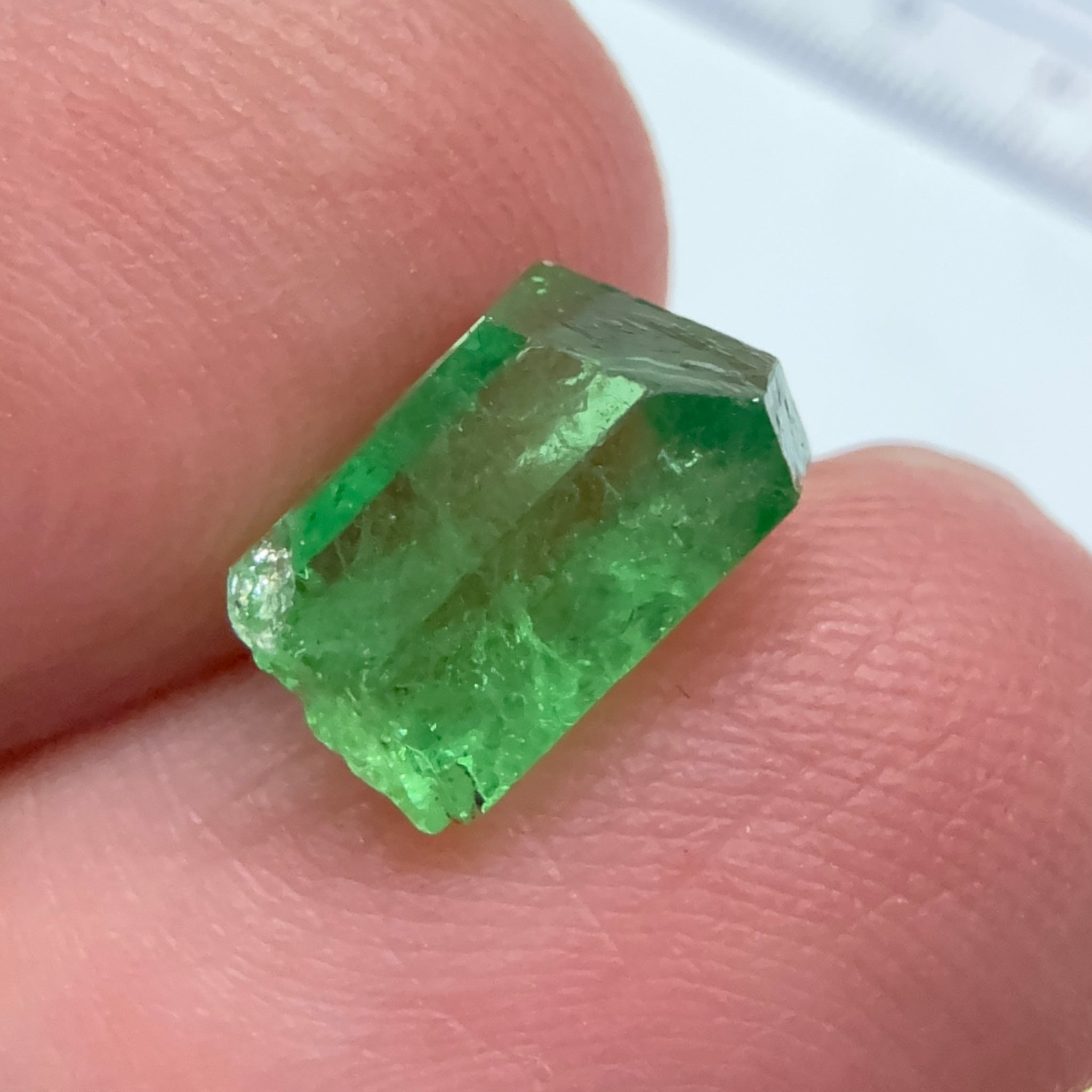 Tsavorite Garnet Crystal, 3.65ct A very unusual Tsavorite crystal from Merelani in Tanzania, Untreated Unheated, see the photos taken in different lights