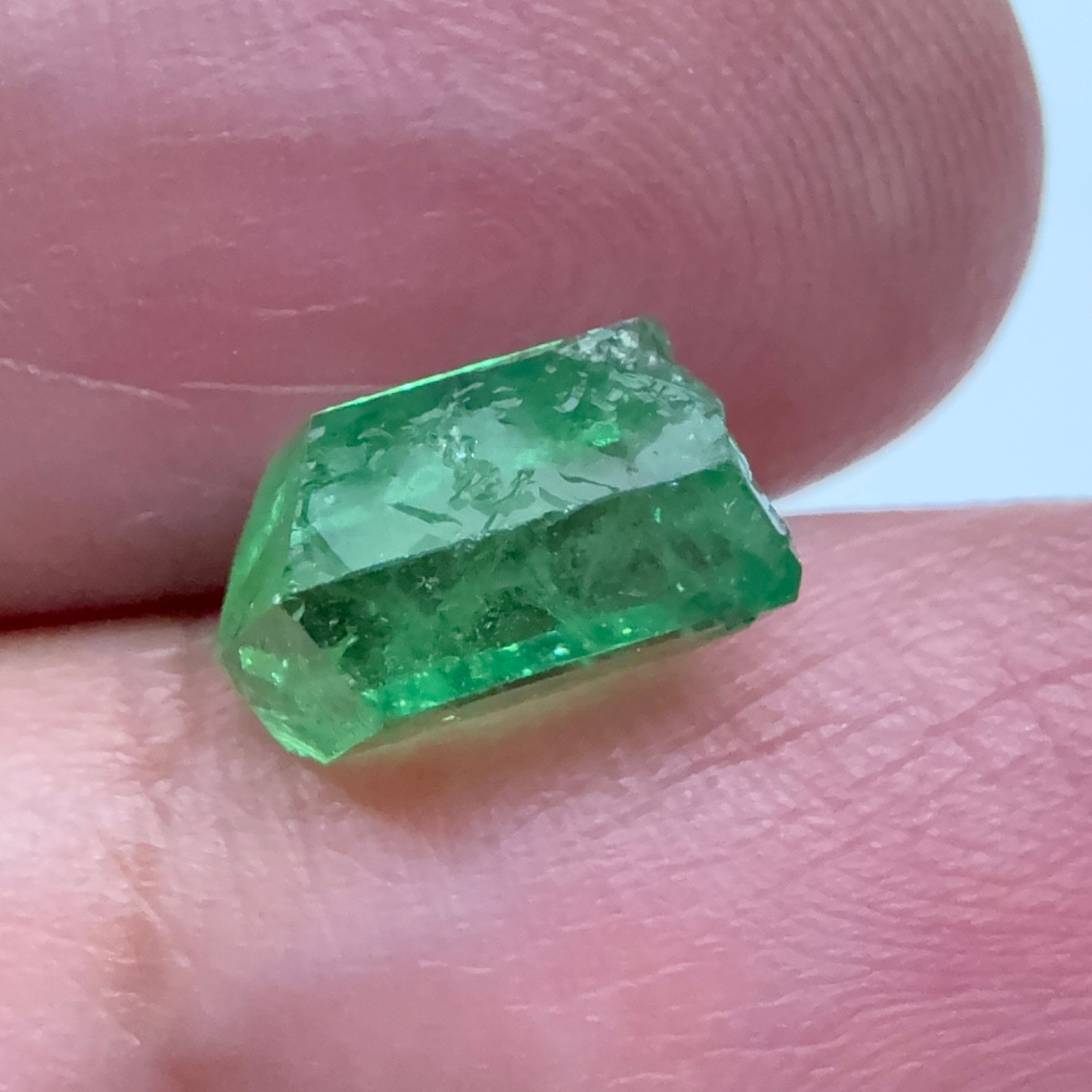 Tsavorite Garnet Crystal, 3.65ct A very unusual Tsavorite crystal from Merelani in Tanzania, Untreated Unheated, see the photos taken in different lights