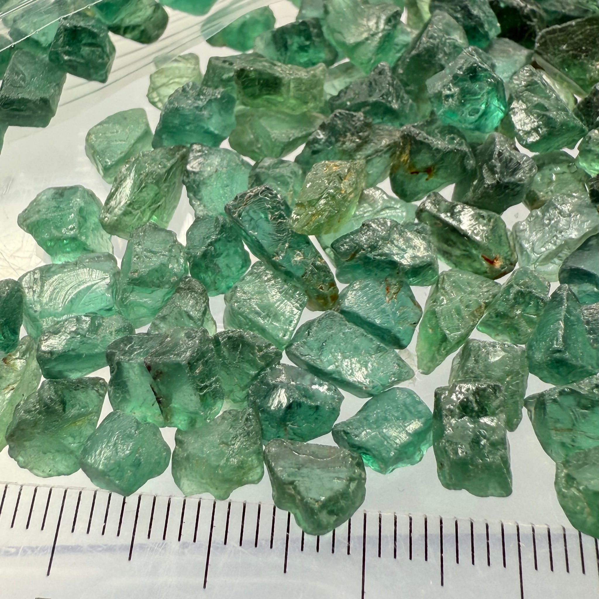 Neon Vivid Blue Green Apatite, Tanzania, Untreated Unheated. SINGLES price is per piece, cabbing, faceting and specimen grade mix, average size 1.8ct sold on a blind pour, see closeups