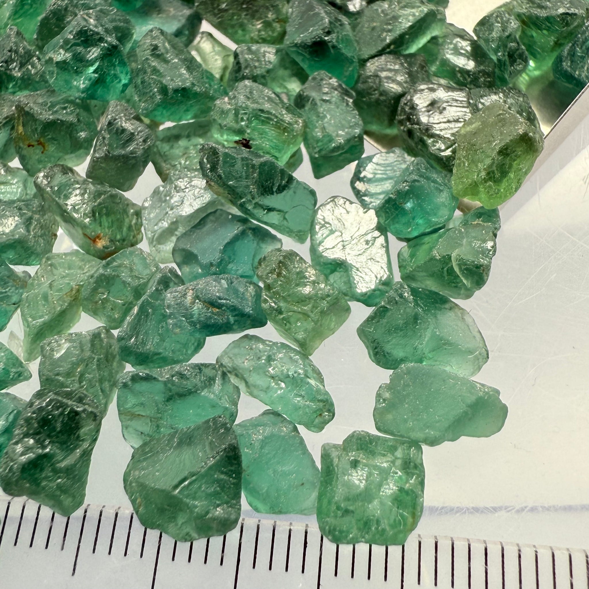 Neon Vivid Blue Green Apatite, Tanzania, Untreated Unheated. SINGLES price is per piece, cabbing, faceting and specimen grade mix, average size 1.8ct sold on a blind pour, see closeups
