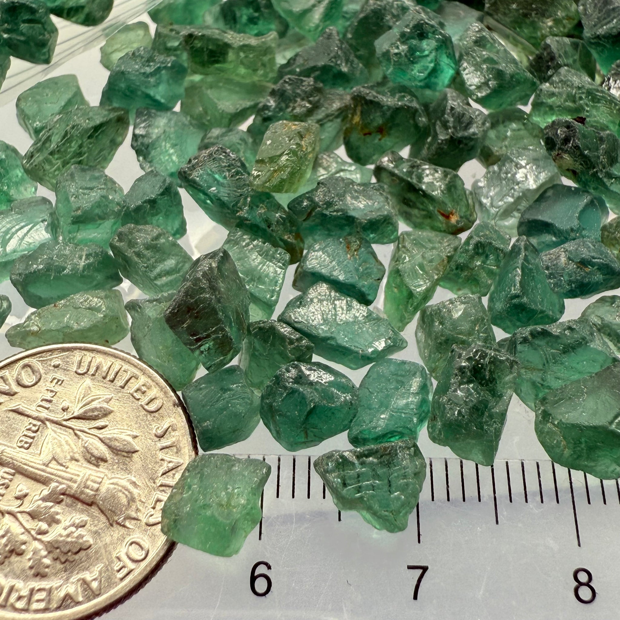 Neon Vivid Blue Green Apatite, Tanzania, Untreated Unheated. SINGLES price is per piece, cabbing, faceting and specimen grade mix, average size 1.8ct sold on a blind pour, see closeups