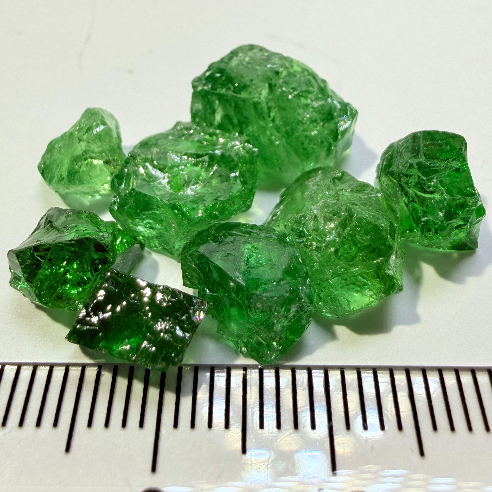 Tsavorite Garnet Lot, 34.64ct, Tanzania, Untreated Unheated, 8pcs, 4.33ct av. cut with veils, some has slight cracks on the outside that need to be removed on pre-form