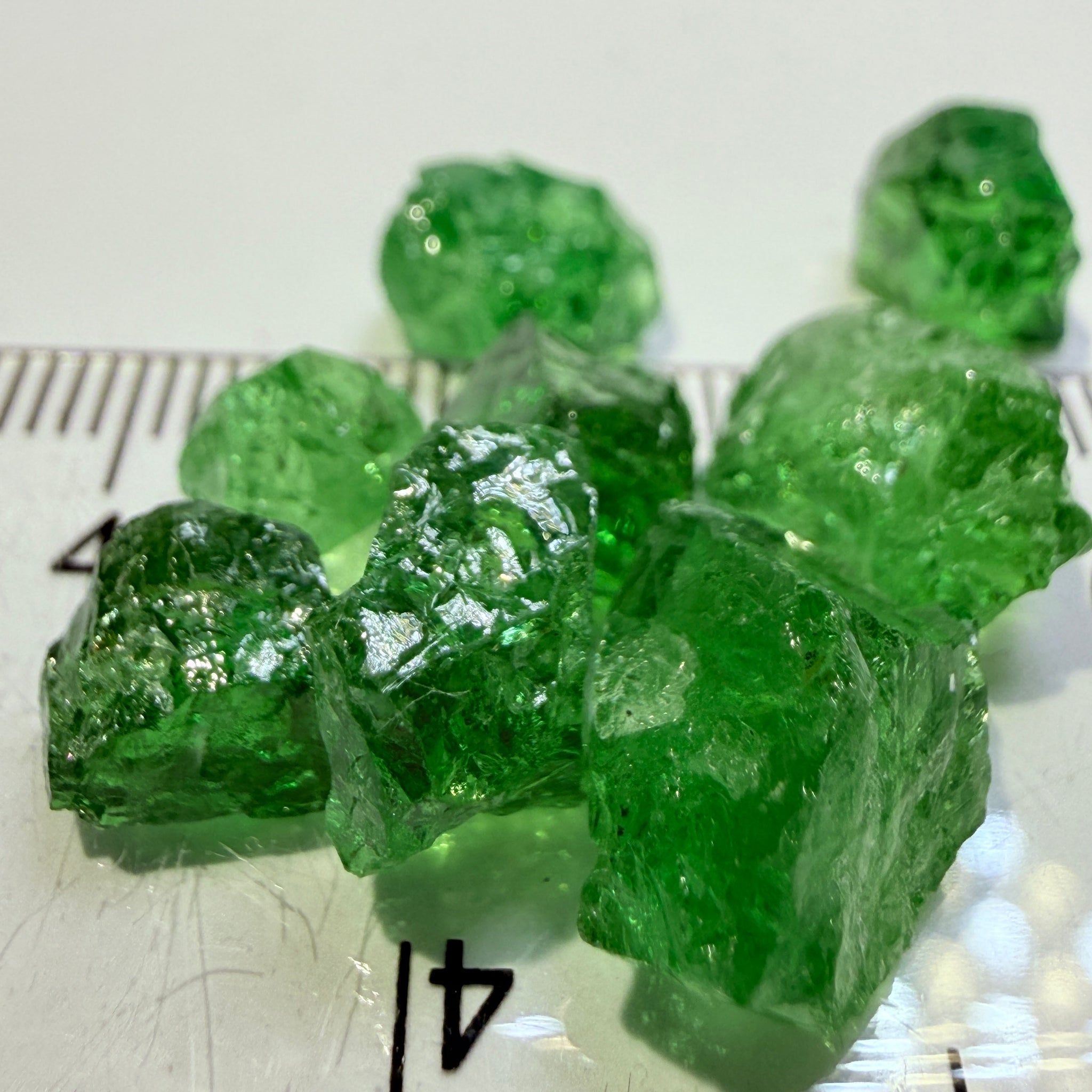 Tsavorite Garnet Lot, 34.64ct, Tanzania, Untreated Unheated, 8pcs, 4.33ct av. cut with veils, some has slight cracks on the outside that need to be removed on pre-form
