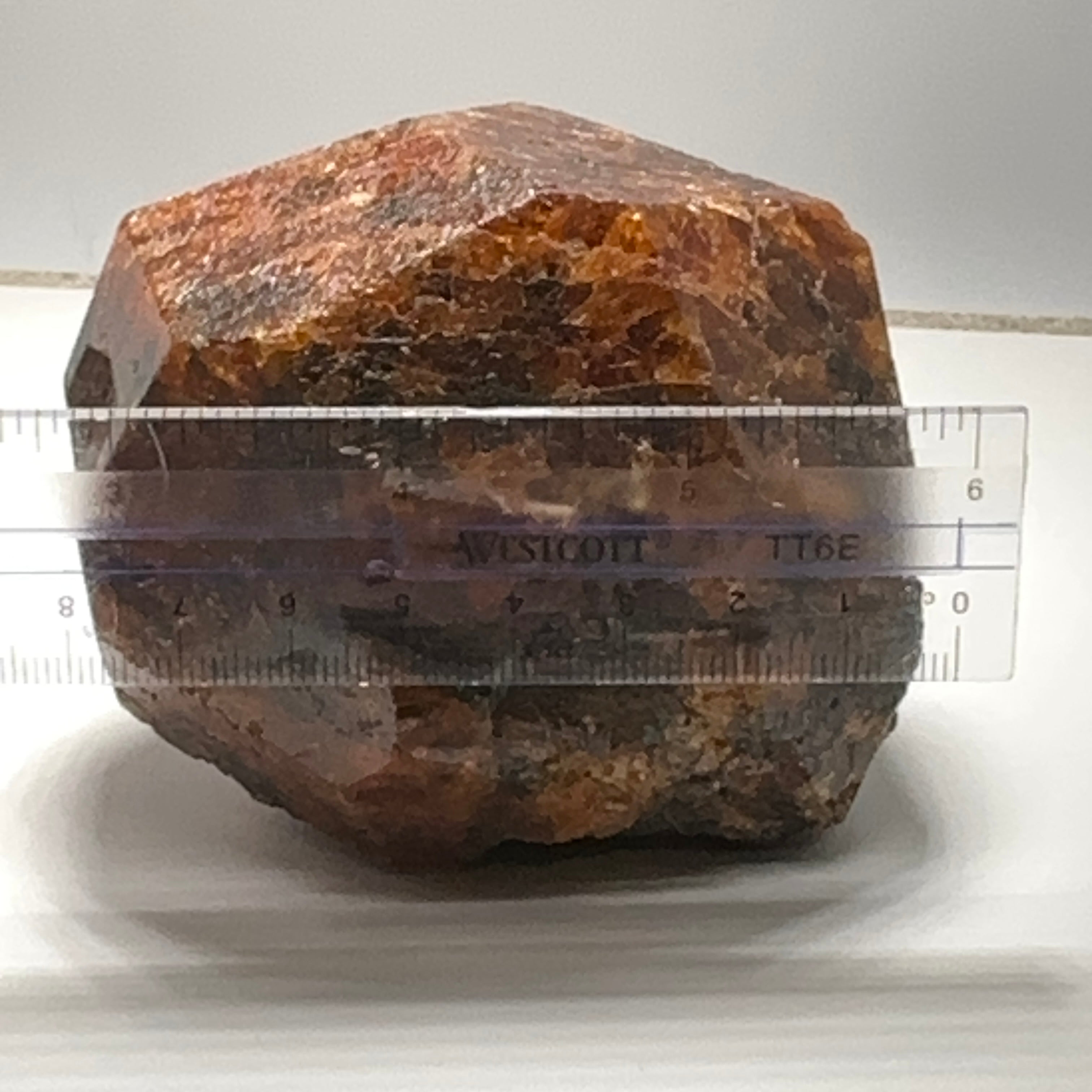 797gm (3985ct) Mandarin Spessartite Garnet Crystal, Loliondo, Tanzania. 87 x 67 x 64mm. Untreated Unheated