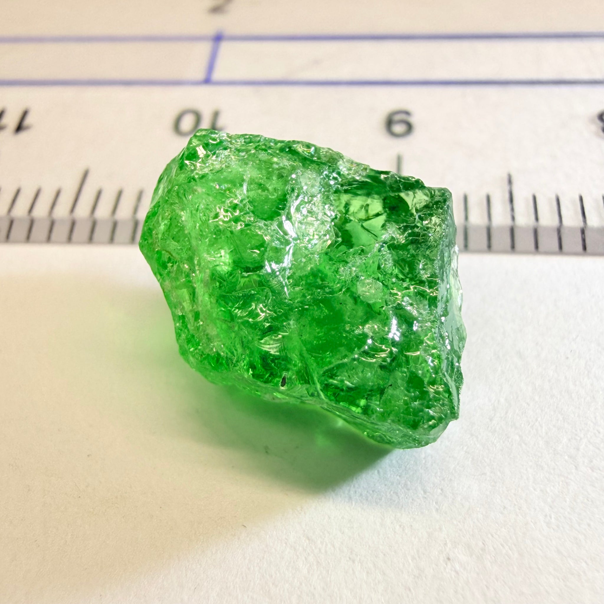 Tsavorite, 8.70ct, Tanzania, Untreated Unheated, slightly veiled, with a dividing crack, I have marked the position of the dividing crack in one of the pics