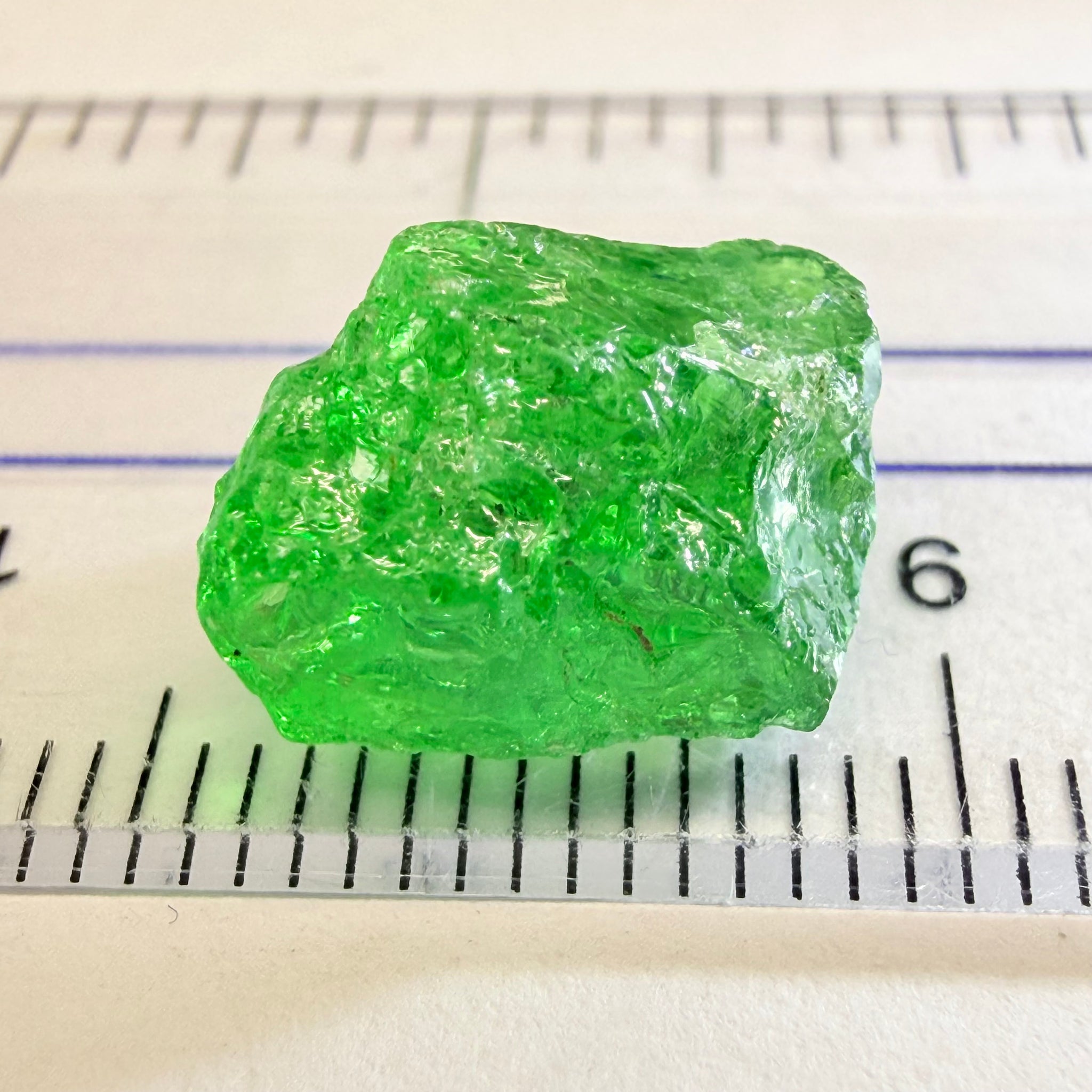 Tsavorite, 8.70ct, Tanzania, Untreated Unheated, slightly veiled, with a dividing crack, I have marked the position of the dividing crack in one of the pics