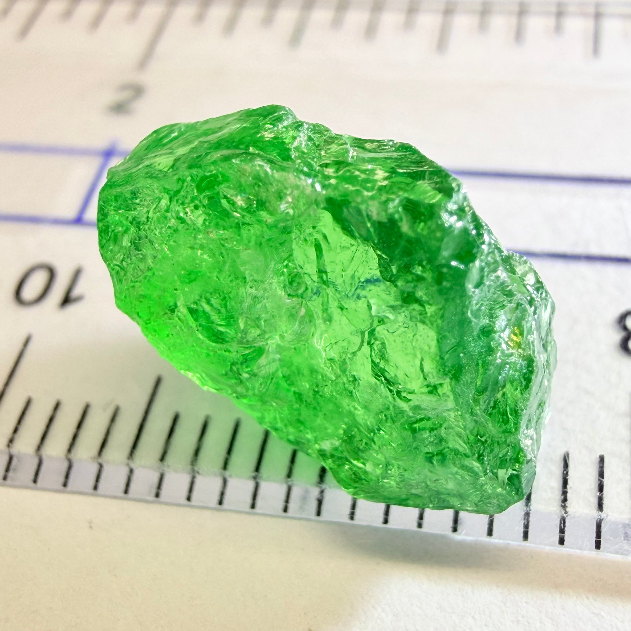 Tsavorite, 8.70ct, Tanzania, Untreated Unheated, slightly veiled, with a dividing crack, I have marked the position of the dividing crack in one of the pics