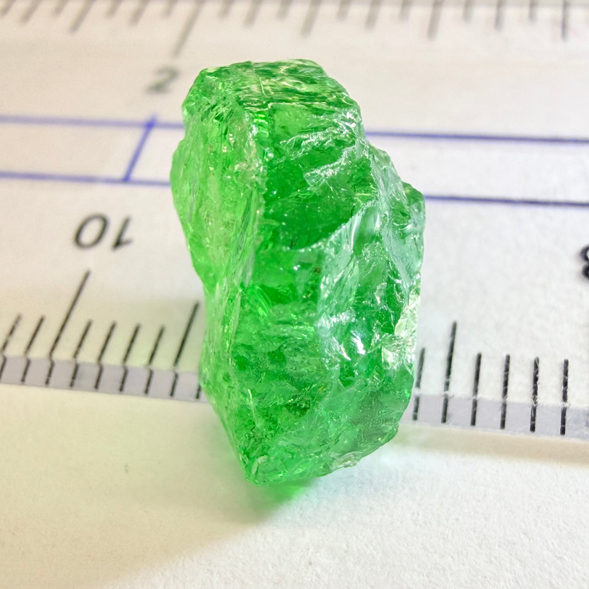 Tsavorite, 8.70ct, Tanzania, Untreated Unheated, slightly veiled, with a dividing crack, I have marked the position of the dividing crack in one of the pics