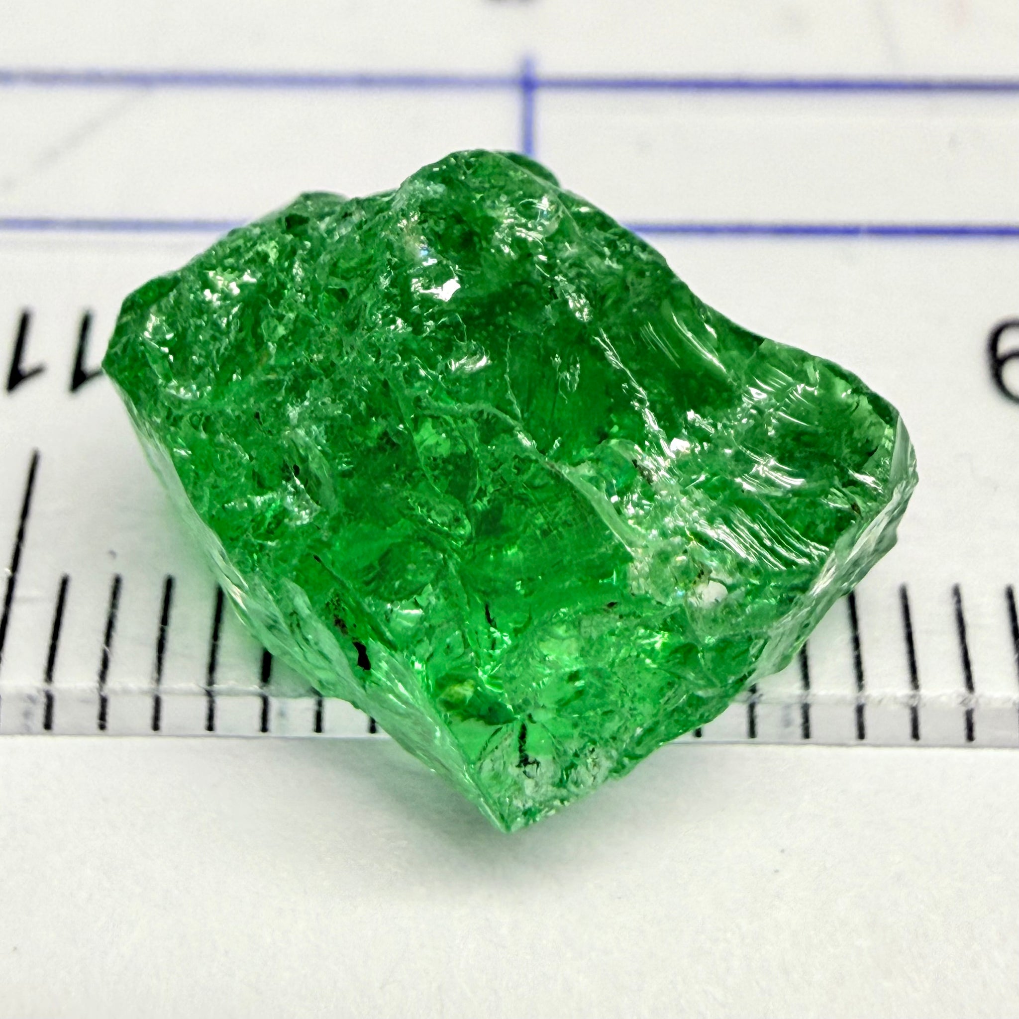 Tsavorite, 8.70ct, Tanzania, Untreated Unheated, slightly veiled, with a dividing crack, I have marked the position of the dividing crack in one of the pics