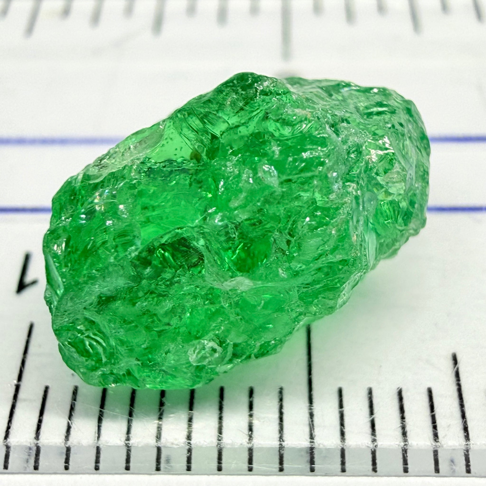 Tsavorite, 8.70ct, Tanzania, Untreated Unheated, slightly veiled, with a dividing crack, I have marked the position of the dividing crack in one of the pics