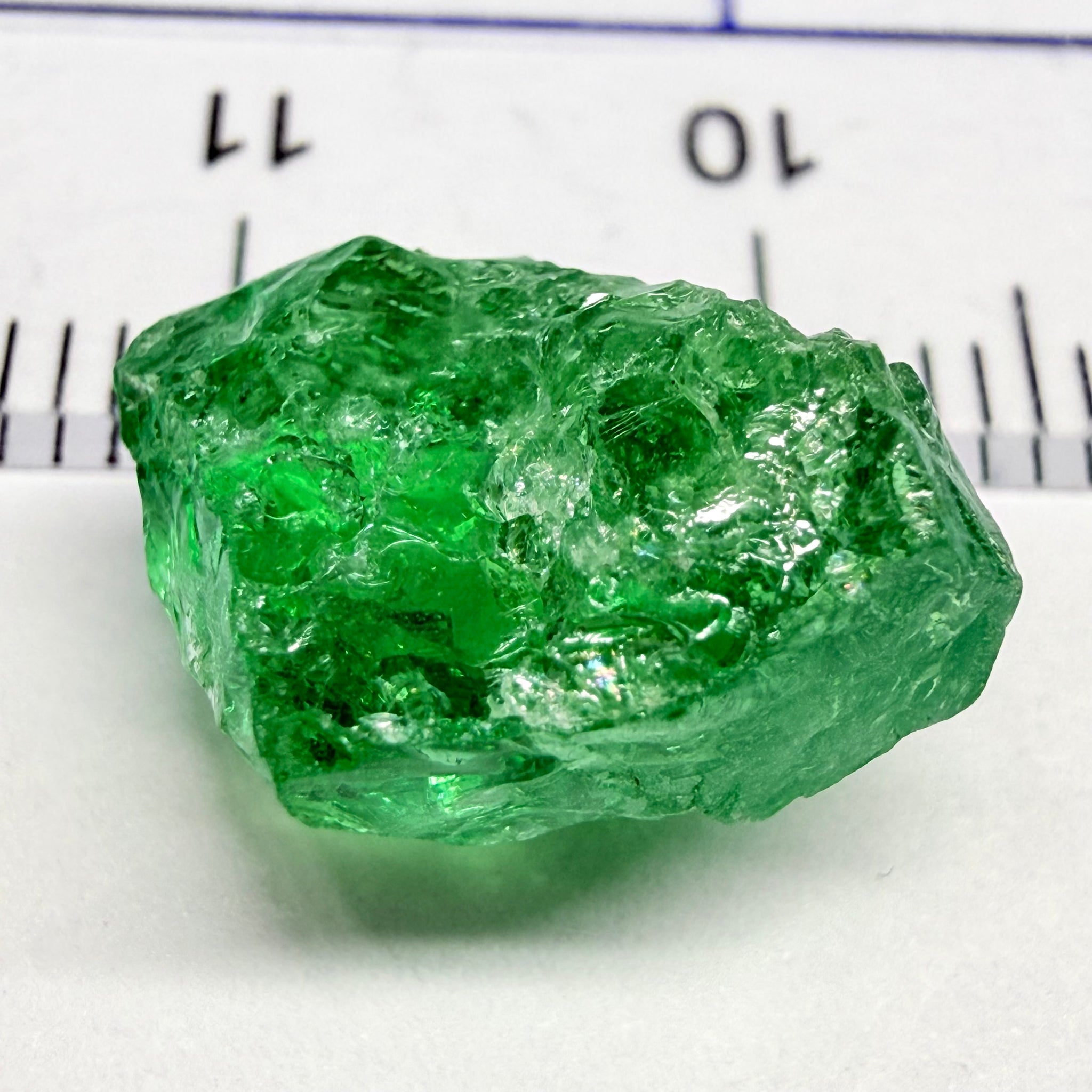 Tsavorite, 8.70ct, Tanzania, Untreated Unheated, slightly veiled, with a dividing crack, I have marked the position of the dividing crack in one of the pics