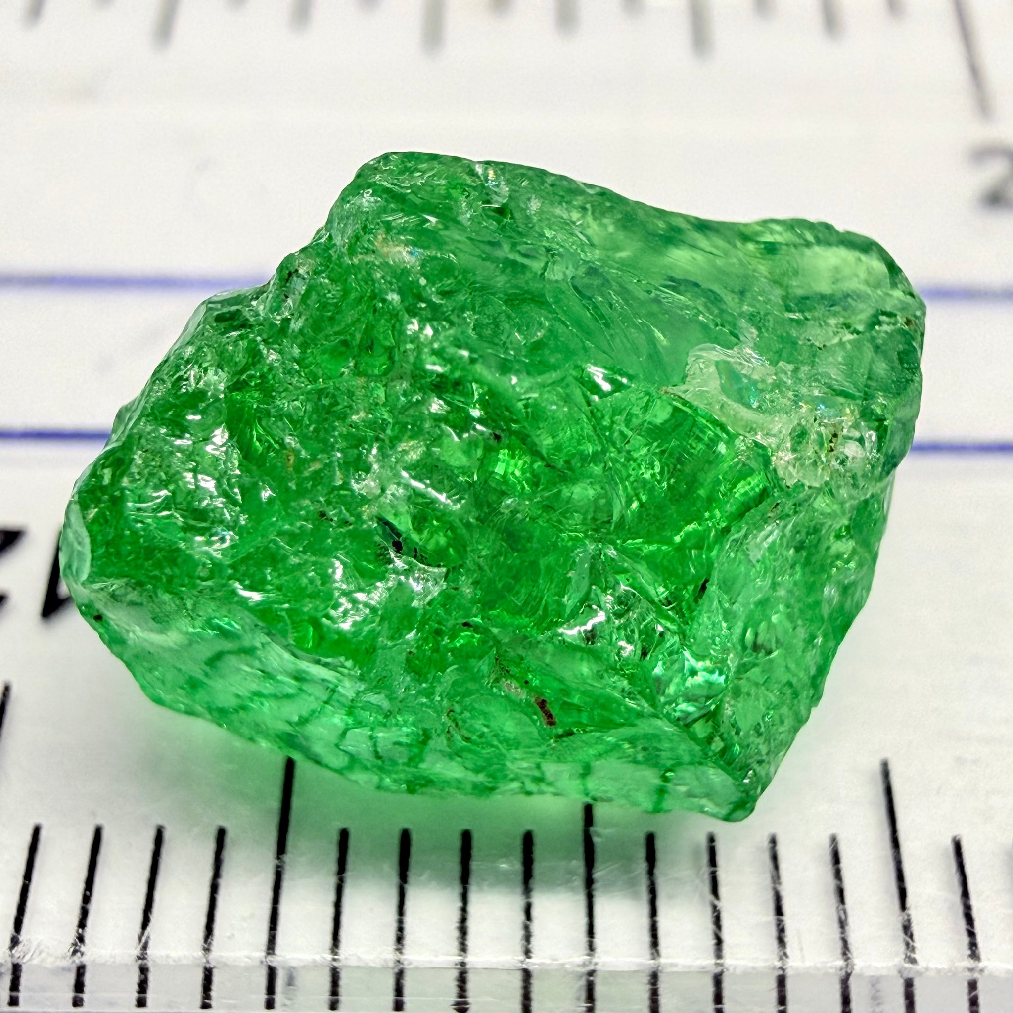 Tsavorite, 8.70ct, Tanzania, Untreated Unheated, slightly veiled, with a dividing crack, I have marked the position of the dividing crack in one of the pics