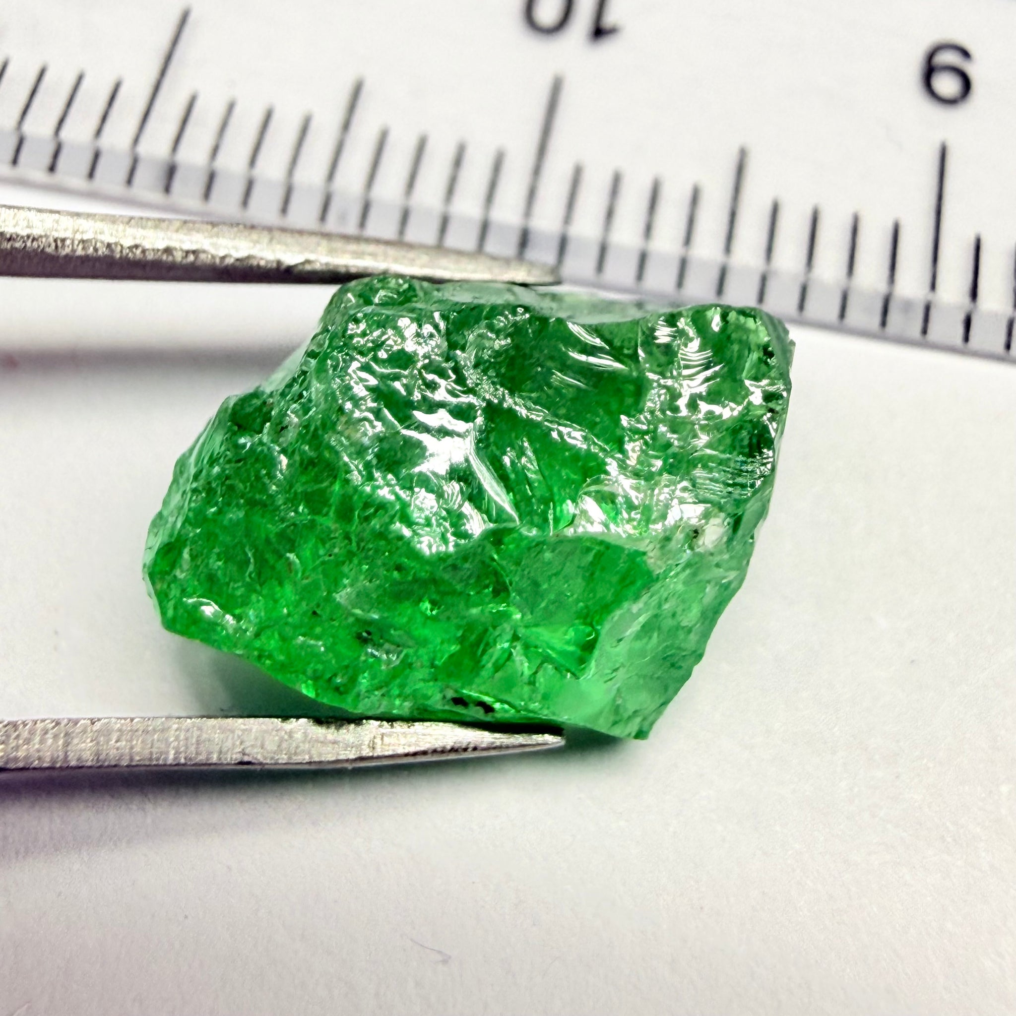 Tsavorite, 8.70ct, Tanzania, Untreated Unheated, slightly veiled, with a dividing crack, I have marked the position of the dividing crack in one of the pics