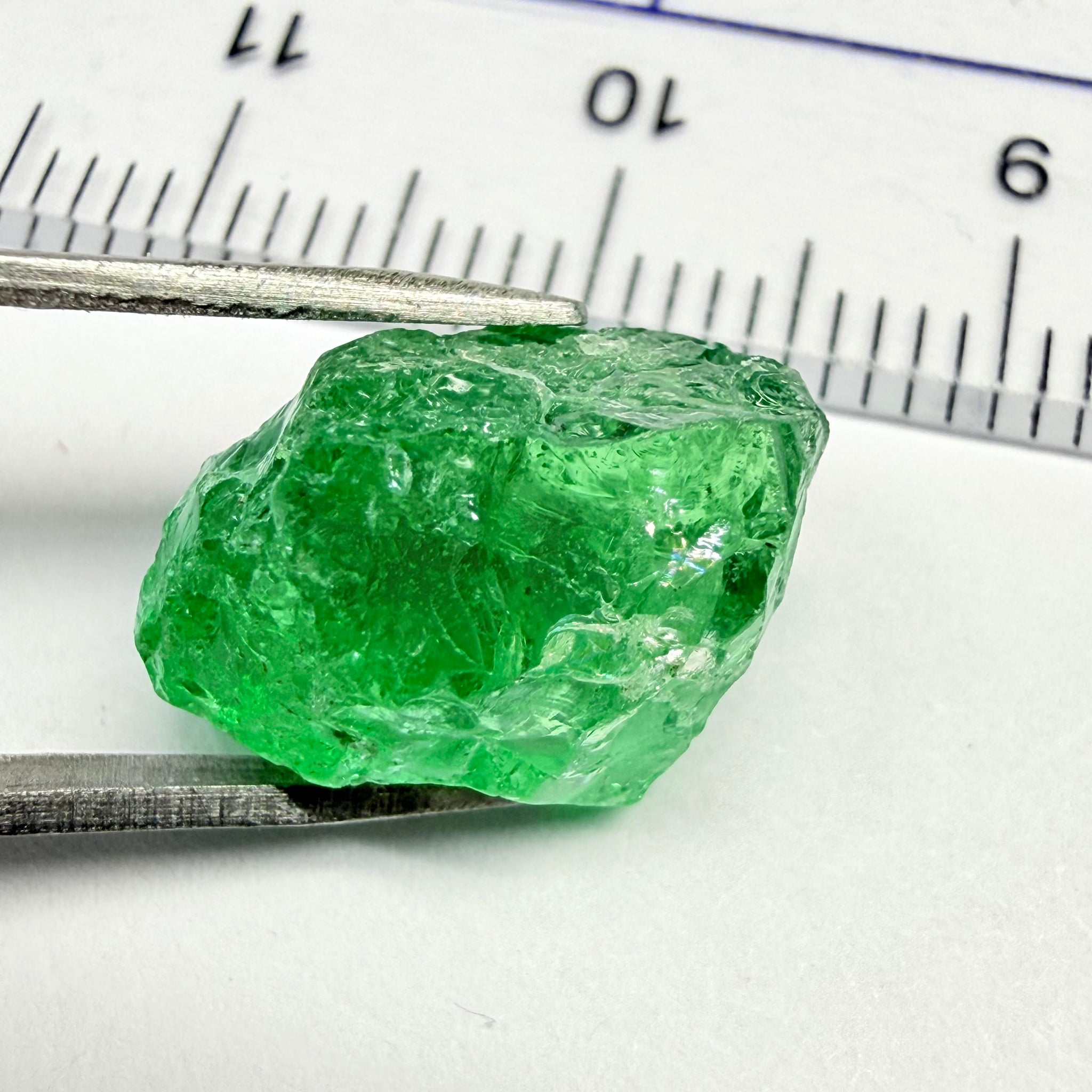 Tsavorite, 8.70ct, Tanzania, Untreated Unheated, slightly veiled, with a dividing crack, I have marked the position of the dividing crack in one of the pics