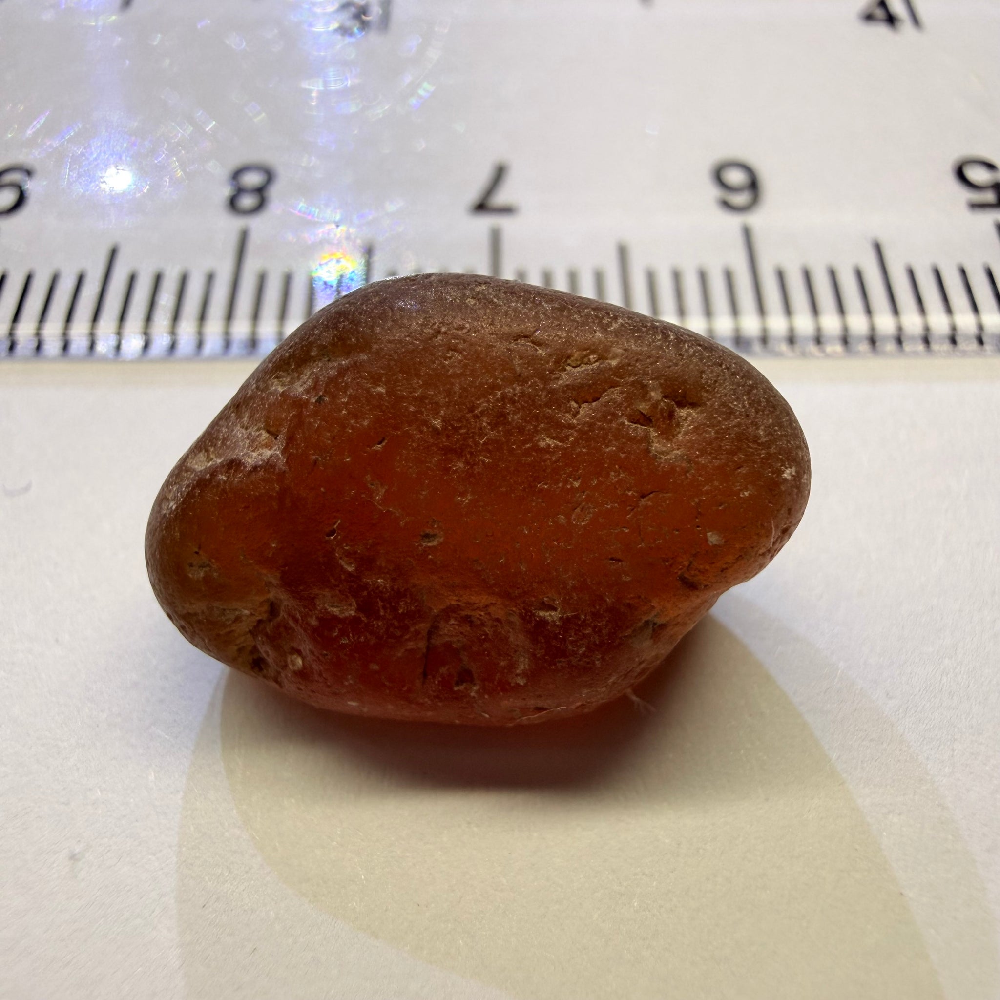 Orange Garnet, 17.39ct, Tunduru, Tanzania, Untreated Unheated, has sugary type inclusions throughout the stone, Si