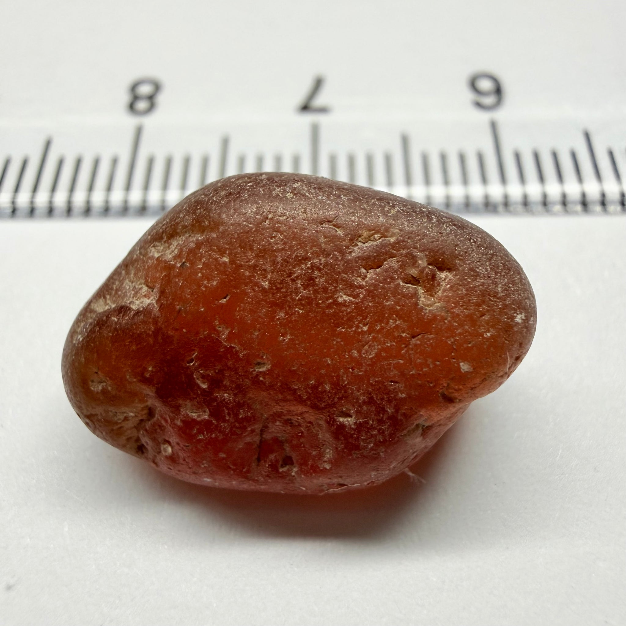 Orange Garnet, 17.39ct, Tunduru, Tanzania, Untreated Unheated, has sugary type inclusions throughout the stone, Si