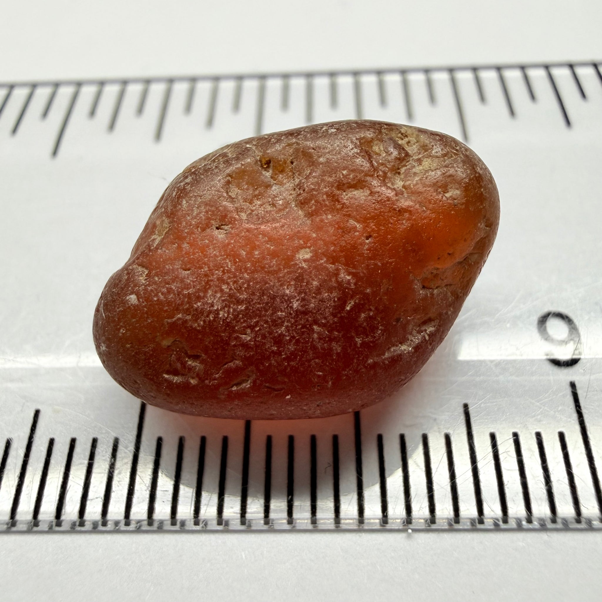 Orange Garnet, 17.39ct, Tunduru, Tanzania, Untreated Unheated, has sugary type inclusions throughout the stone, Si