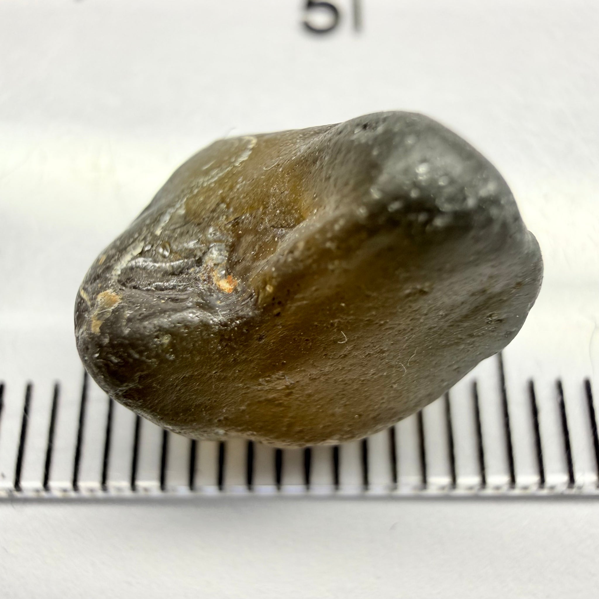 Green Brown Zircon, 12.07ct, Tunduru, Tanzania, Untreated Unheated, vvs-if with the characteristic haze in them found in green zircons from that location