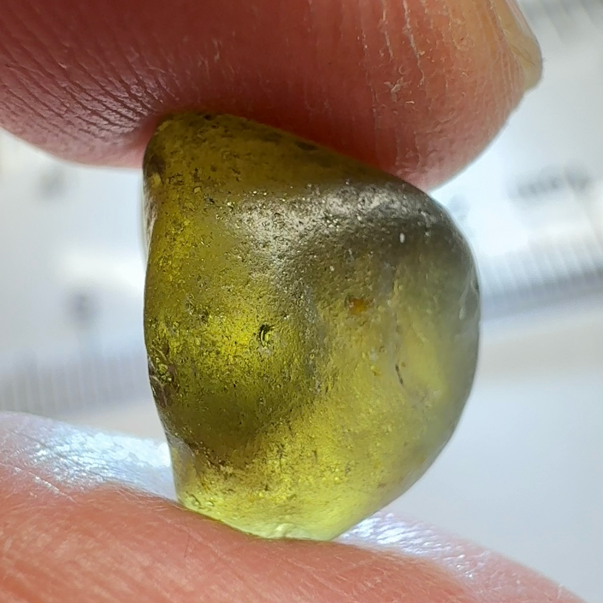 Green Brown Zircon, 12.07ct, Tunduru, Tanzania, Untreated Unheated, vvs-if with the characteristic haze in them found in green zircons from that location