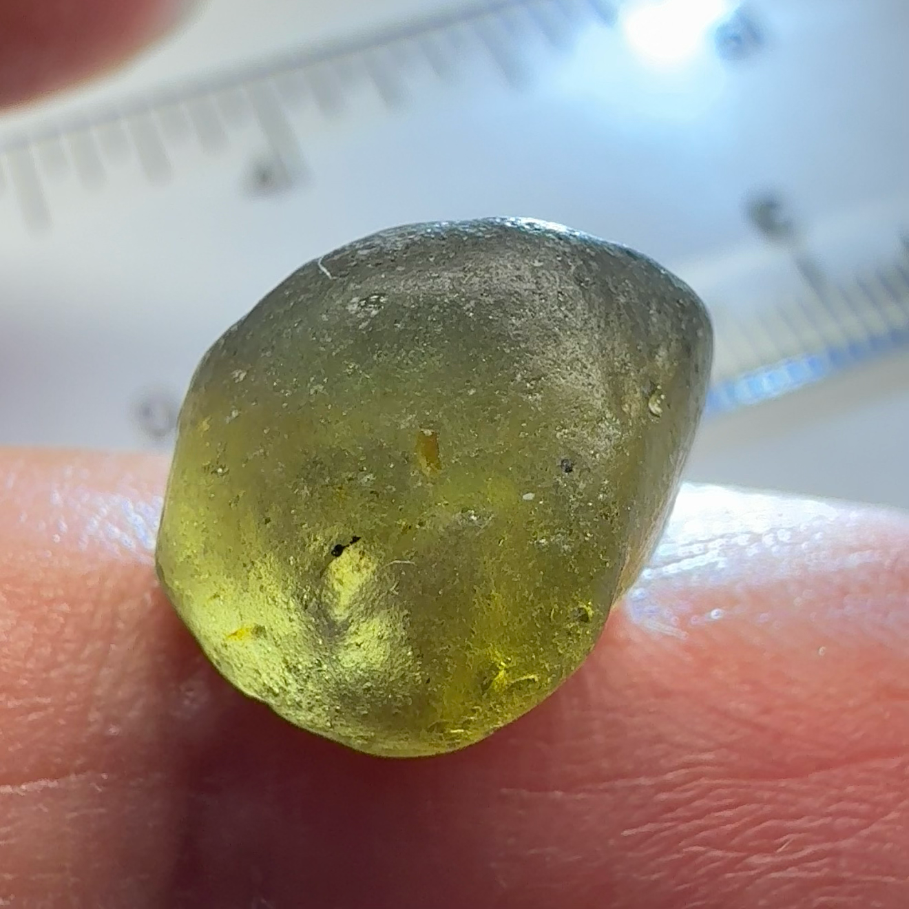Green Brown Zircon, 12.07ct, Tunduru, Tanzania, Untreated Unheated, vvs-if with the characteristic haze in them found in green zircons from that location