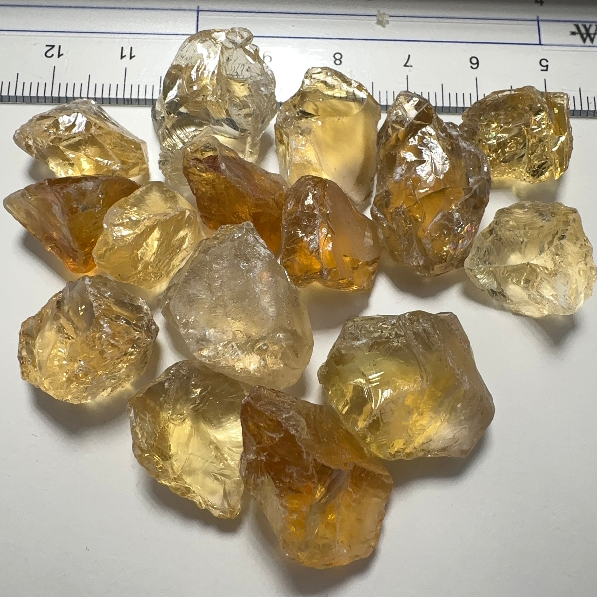 Citrine (Zambian). cracks coming into the stones. 10ct (2gm) to 30ct (6gm) pieces. sold in blind pour basis price is per piece