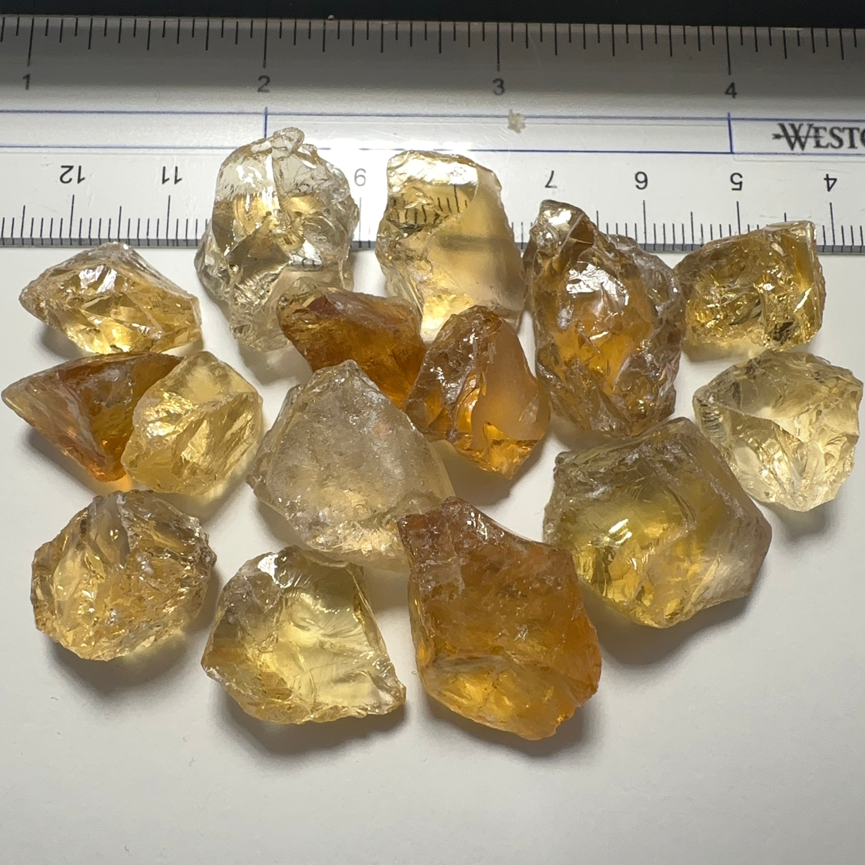 Citrine (Zambian). cracks coming into the stones. 10ct (2gm) to 30ct (6gm) pieces. sold in blind pour basis price is per piece