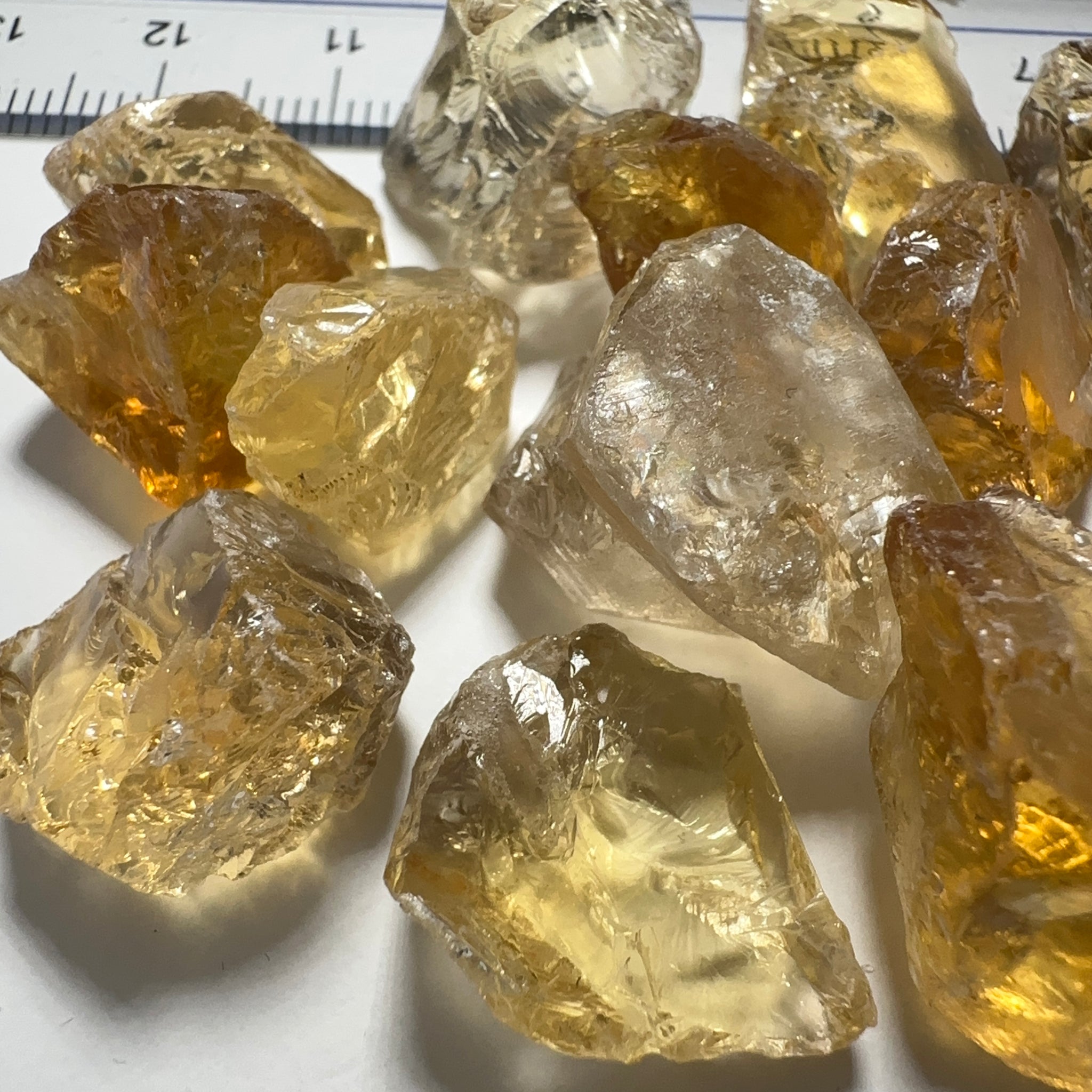 Citrine (Zambian). cracks coming into the stones. 10ct (2gm) to 30ct (6gm) pieces. sold in blind pour basis price is per piece
