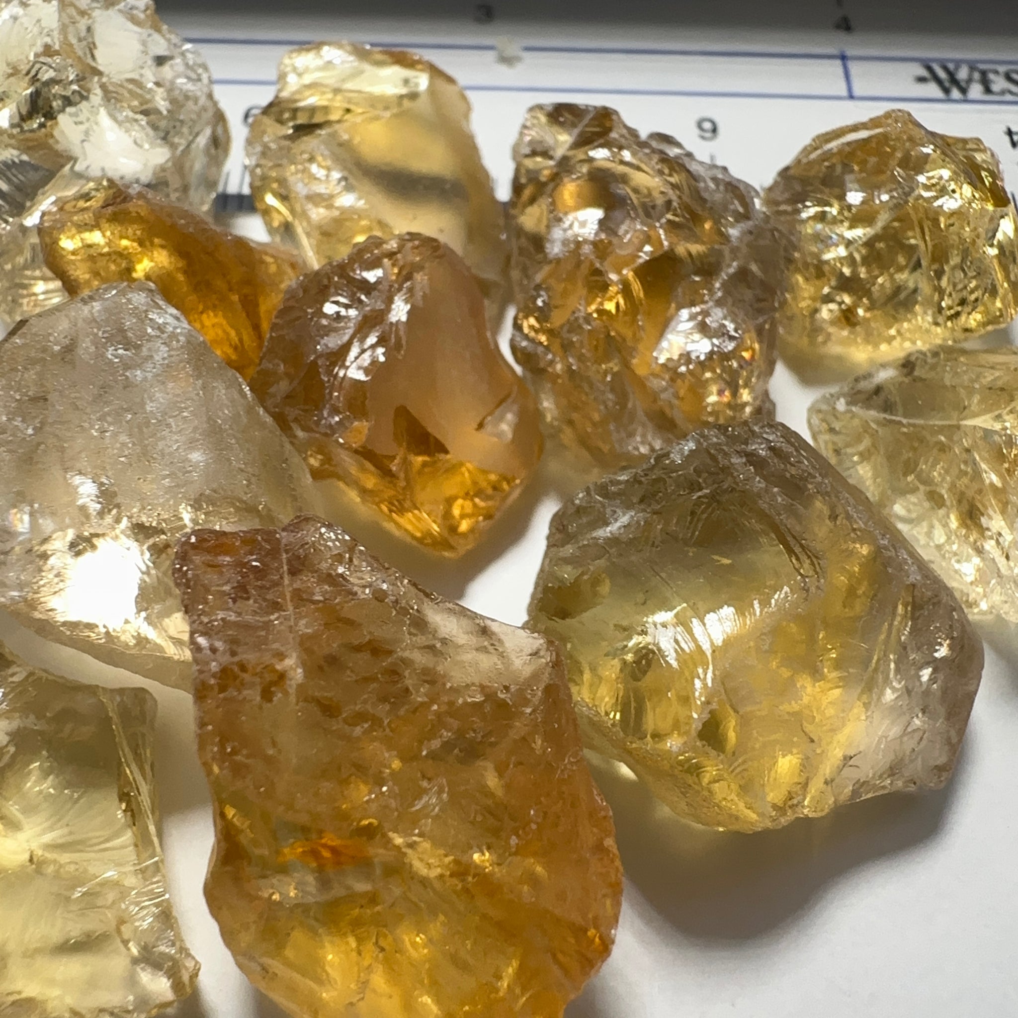Citrine (Zambian). cracks coming into the stones. 10ct (2gm) to 30ct (6gm) pieces. sold in blind pour basis price is per piece