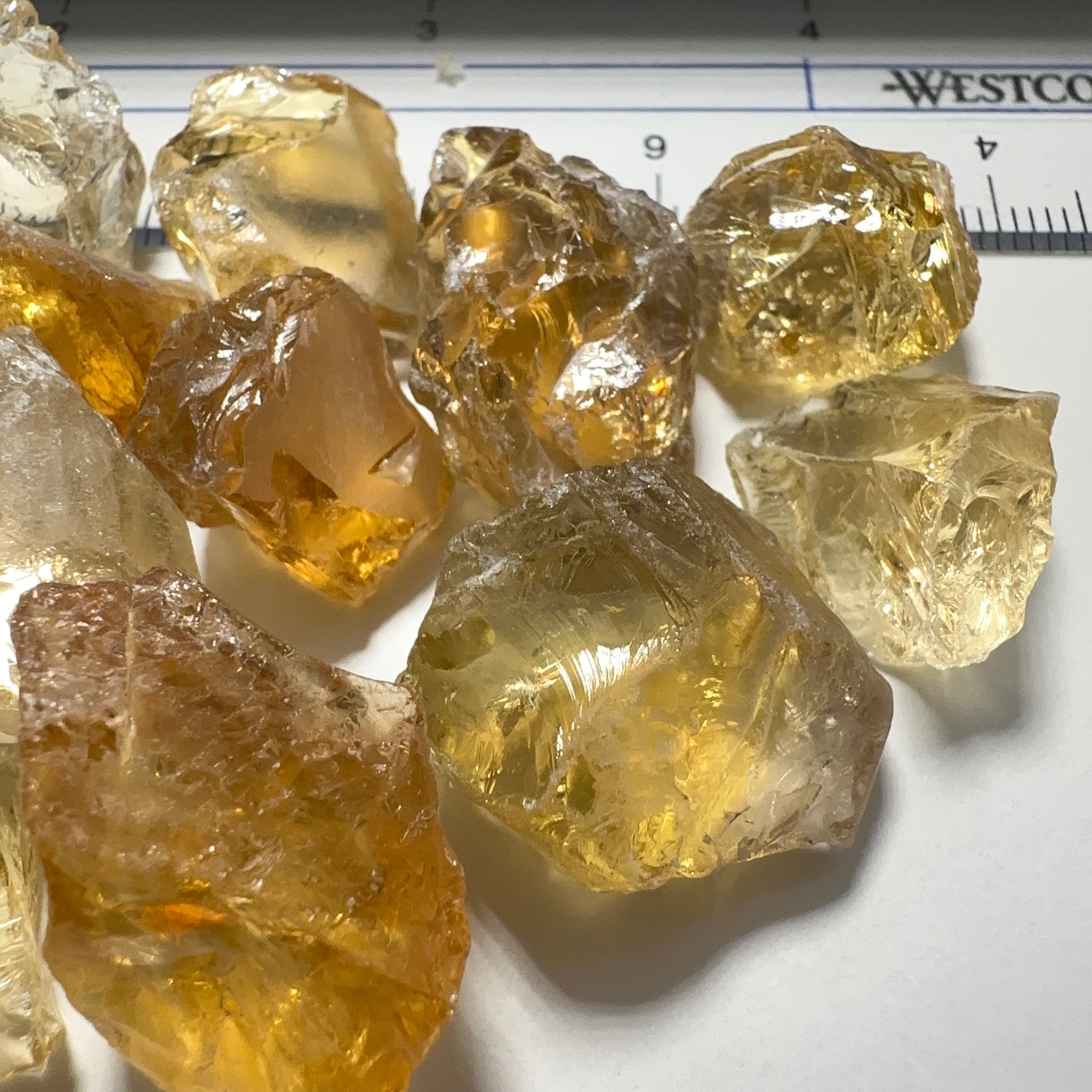 Citrine (Zambian). cracks coming into the stones. 10ct (2gm) to 30ct (6gm) pieces. sold in blind pour basis price is per piece