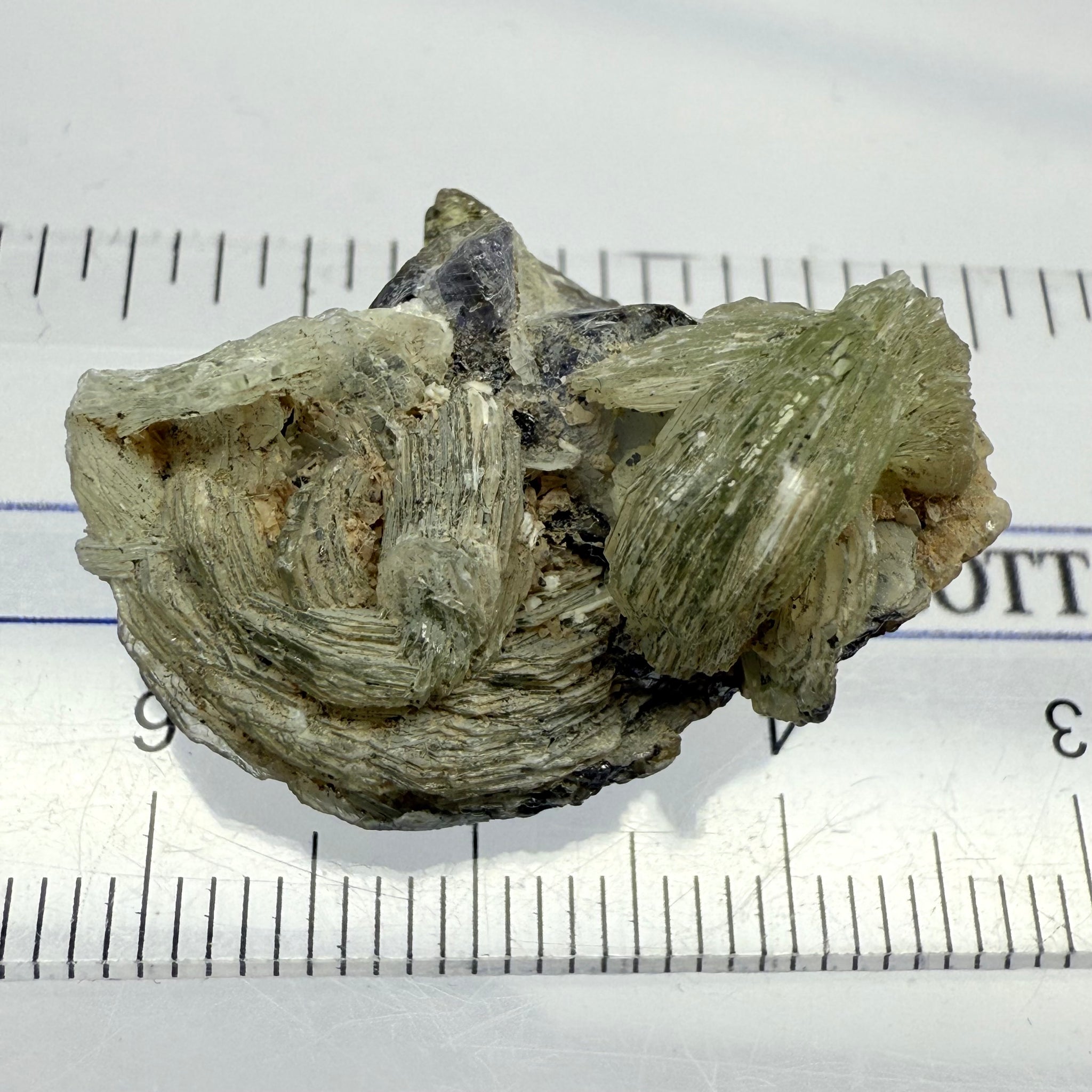 Prehinite with Tanzanite Crystal, 29.84ct, Merelani, Tanzania, Untreated Unheated, see the unheated tanzanite location in the next pictures and video