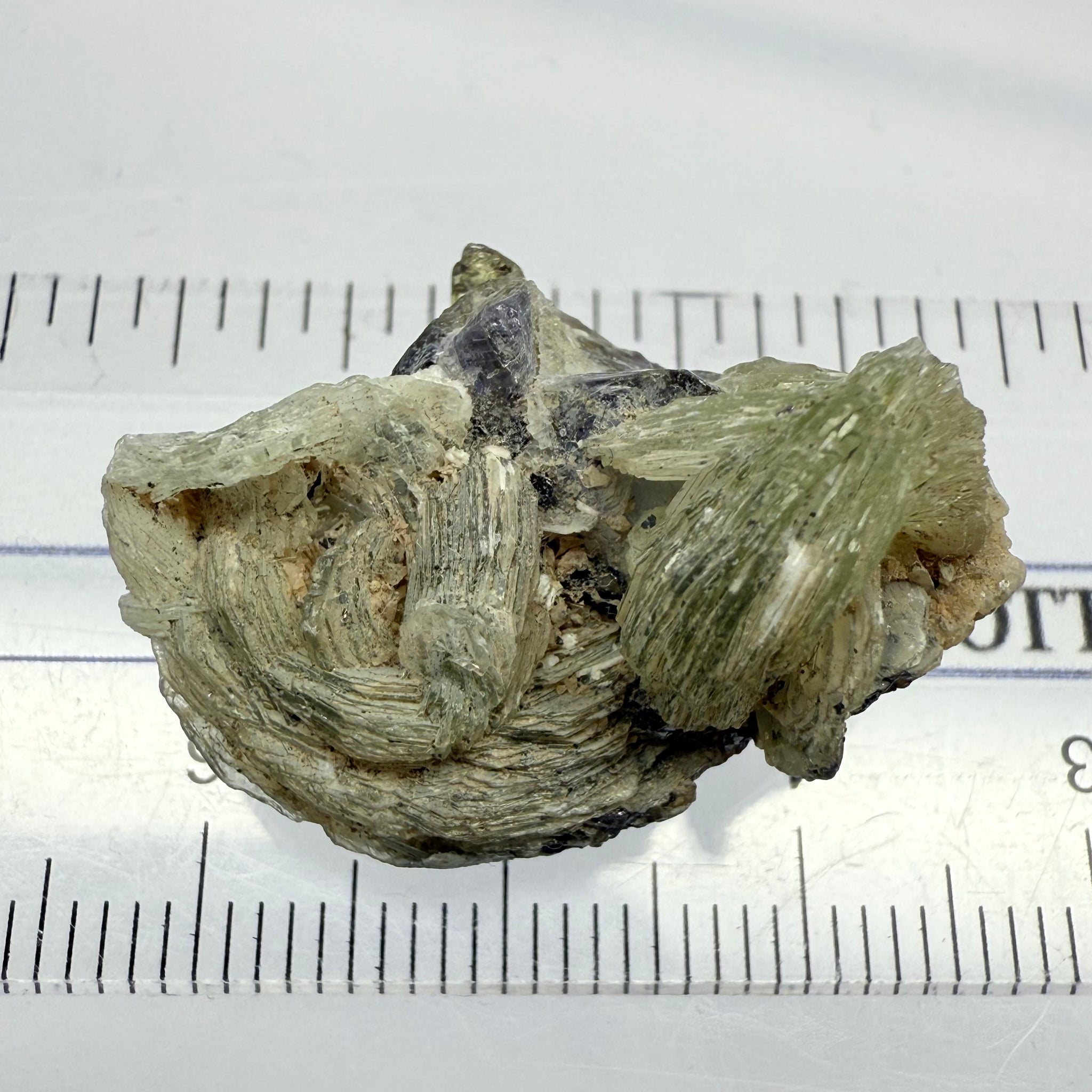 Prehinite with Tanzanite Crystal, 29.84ct, Merelani, Tanzania, Untreated Unheated, see the unheated tanzanite location in the next pictures and video