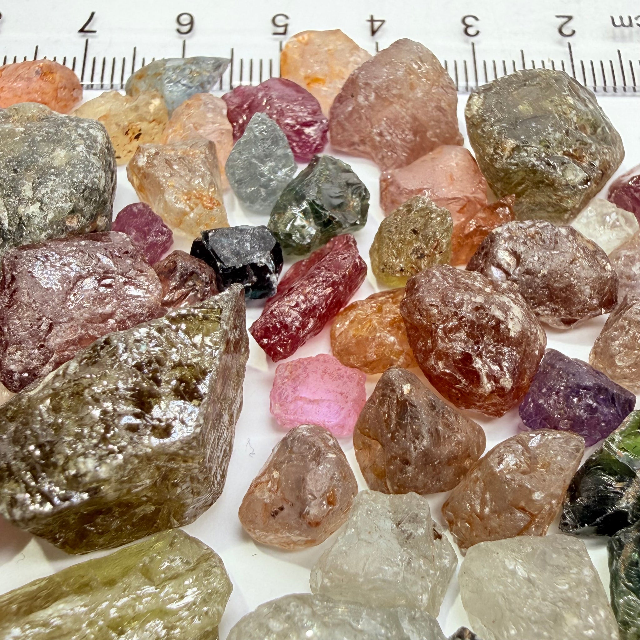 Kenyan and Tanzanian Sapphire mix lot, Slightly included, to included to cabbing grade, an excellent mix, value for money, 94.60gm / 473ct Untreated Unheated, I have included many videos so you get the exact picture