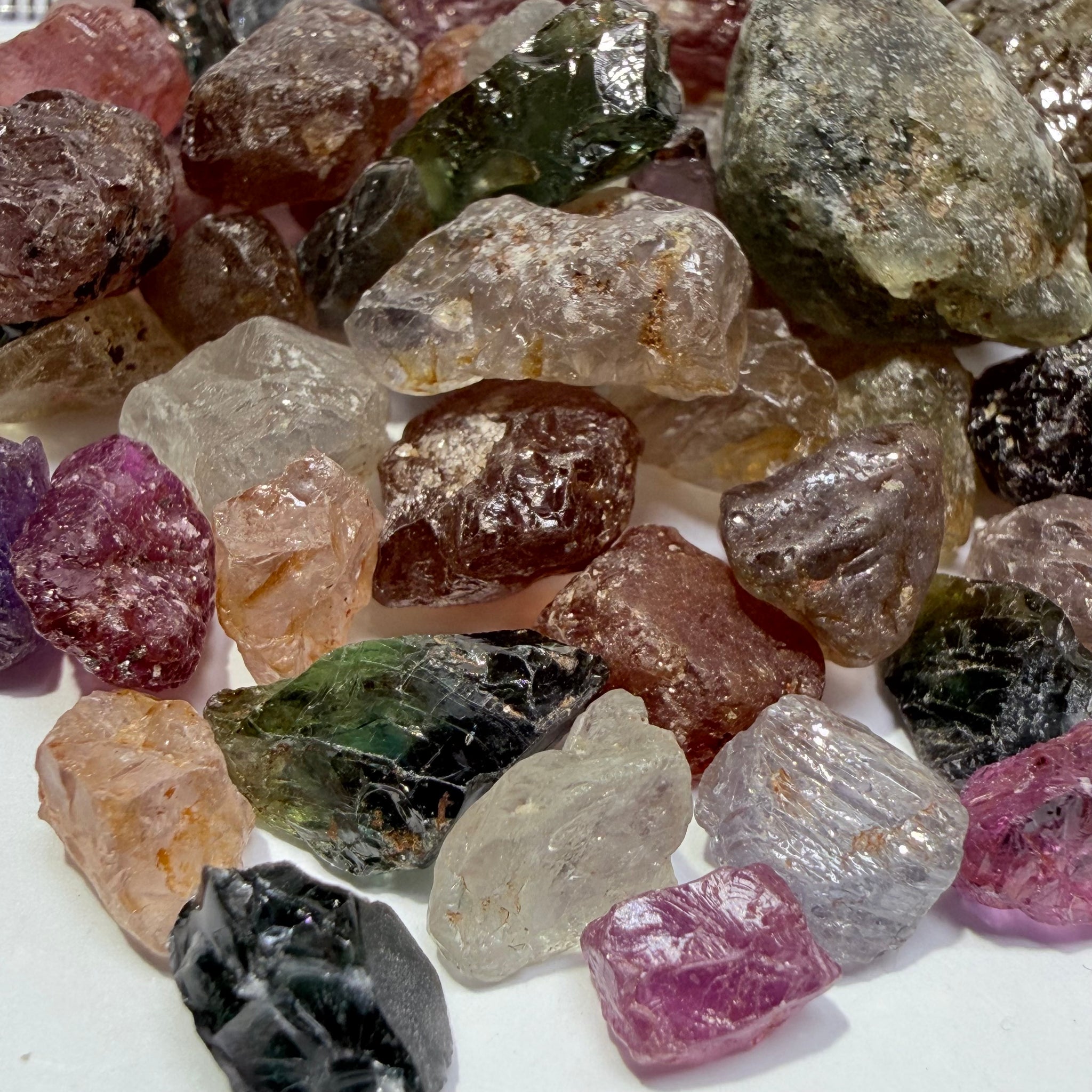 Kenyan and Tanzanian Sapphire mix lot, Slightly included, to included to cabbing grade, an excellent mix, value for money, 94.60gm / 473ct Untreated Unheated, I have included many videos so you get the exact picture