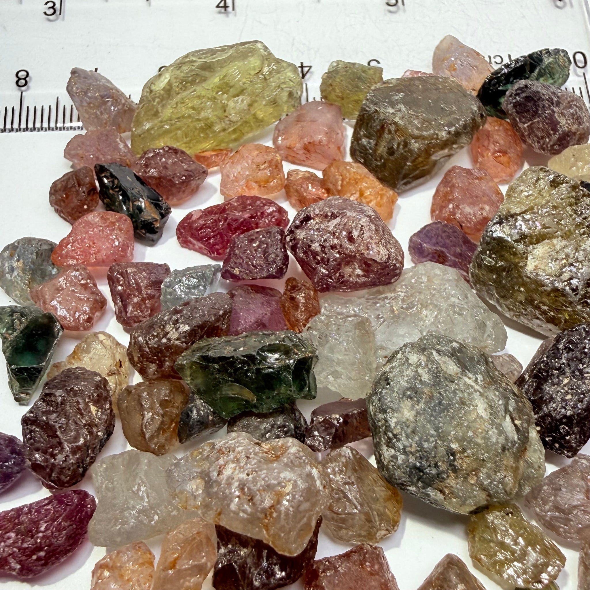 Kenyan and Tanzanian Sapphire mix lot, Slightly included, to included to cabbing grade, an excellent mix, value for money, 94.60gm / 473ct Untreated Unheated, I have included many videos so you get the exact picture