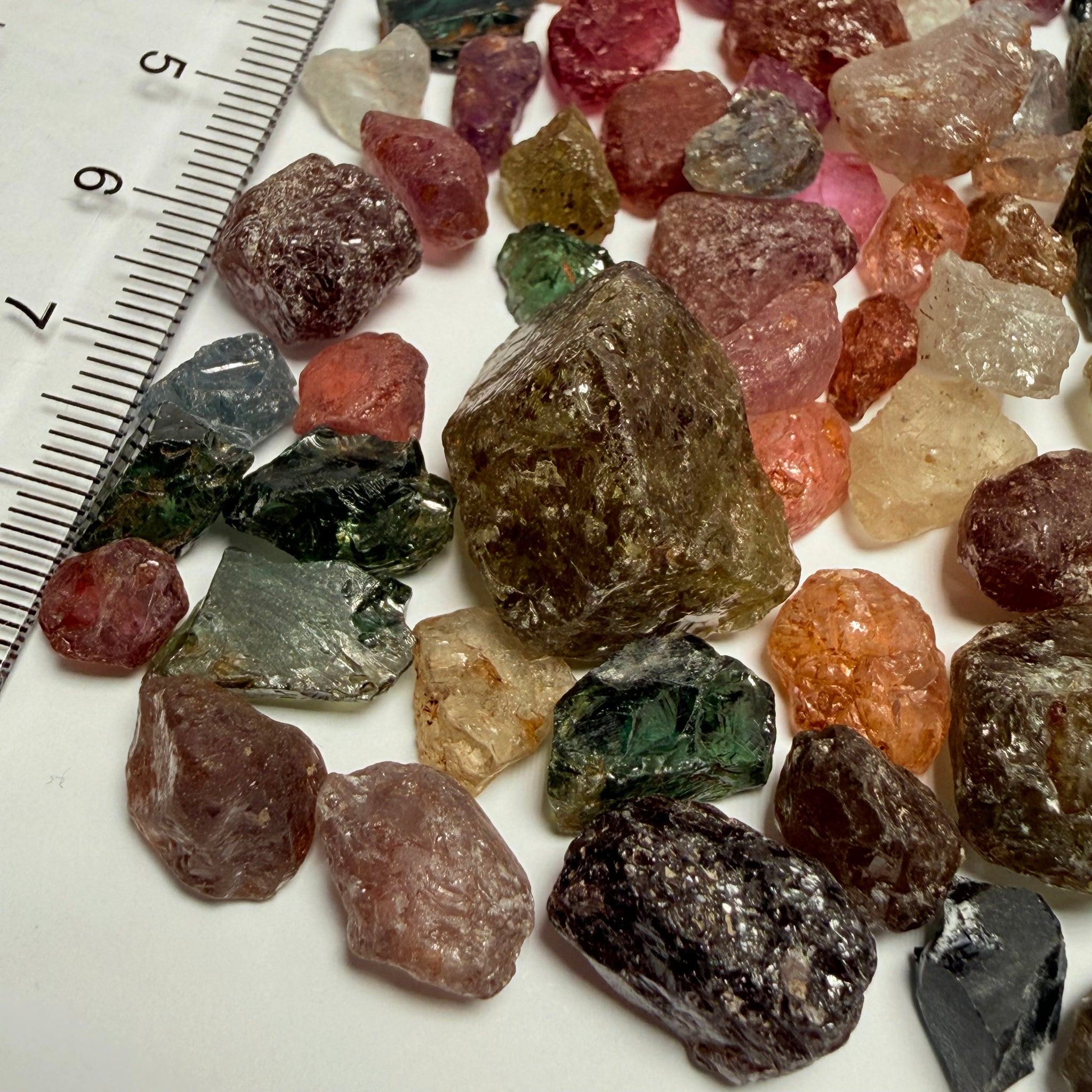 Kenyan and Tanzanian Sapphire mix lot, Slightly included, to included to cabbing grade, an excellent mix, value for money, 94.60gm / 473ct Untreated Unheated, I have included many videos so you get the exact picture