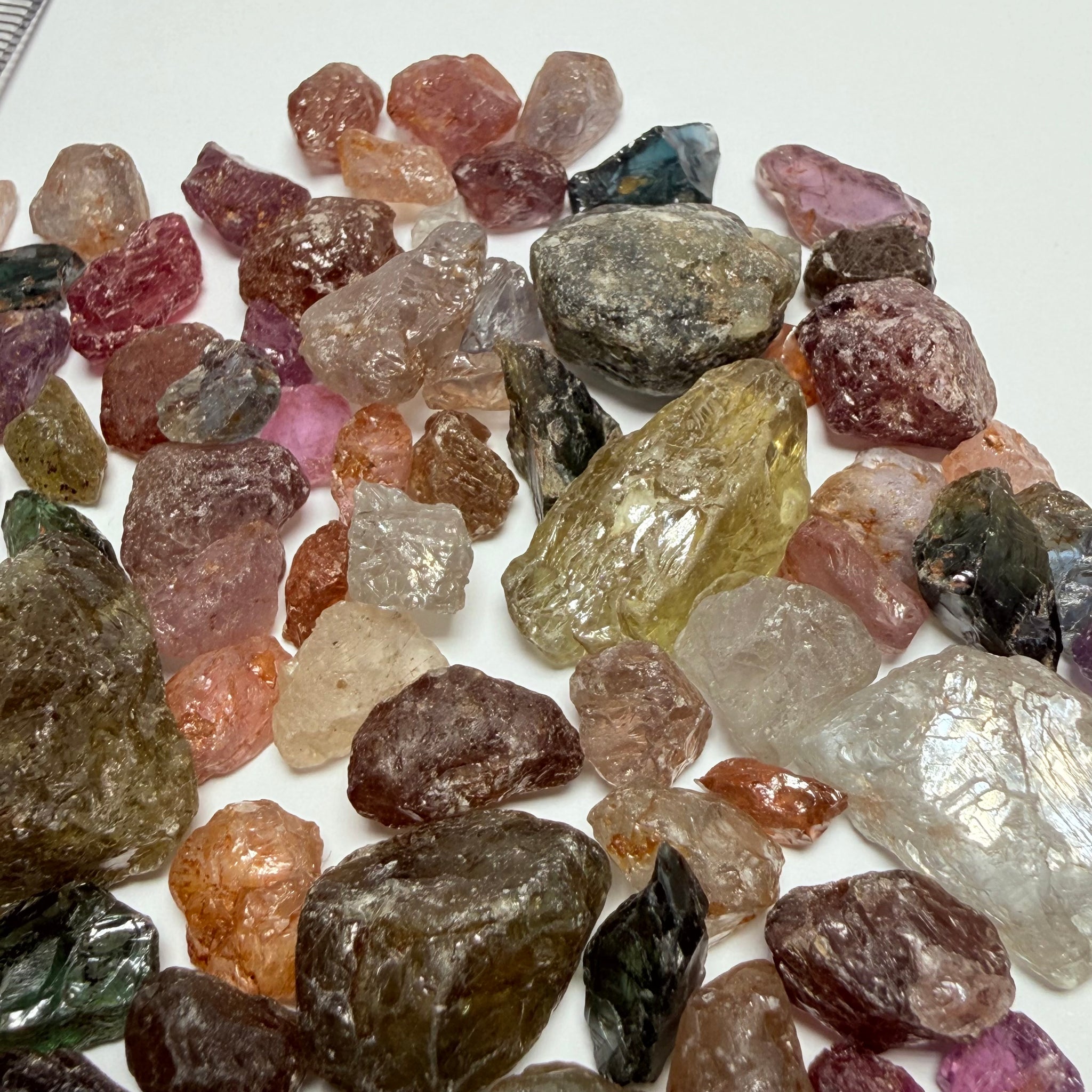 Kenyan and Tanzanian Sapphire mix lot, Slightly included, to included to cabbing grade, an excellent mix, value for money, 94.60gm / 473ct Untreated Unheated, I have included many videos so you get the exact picture