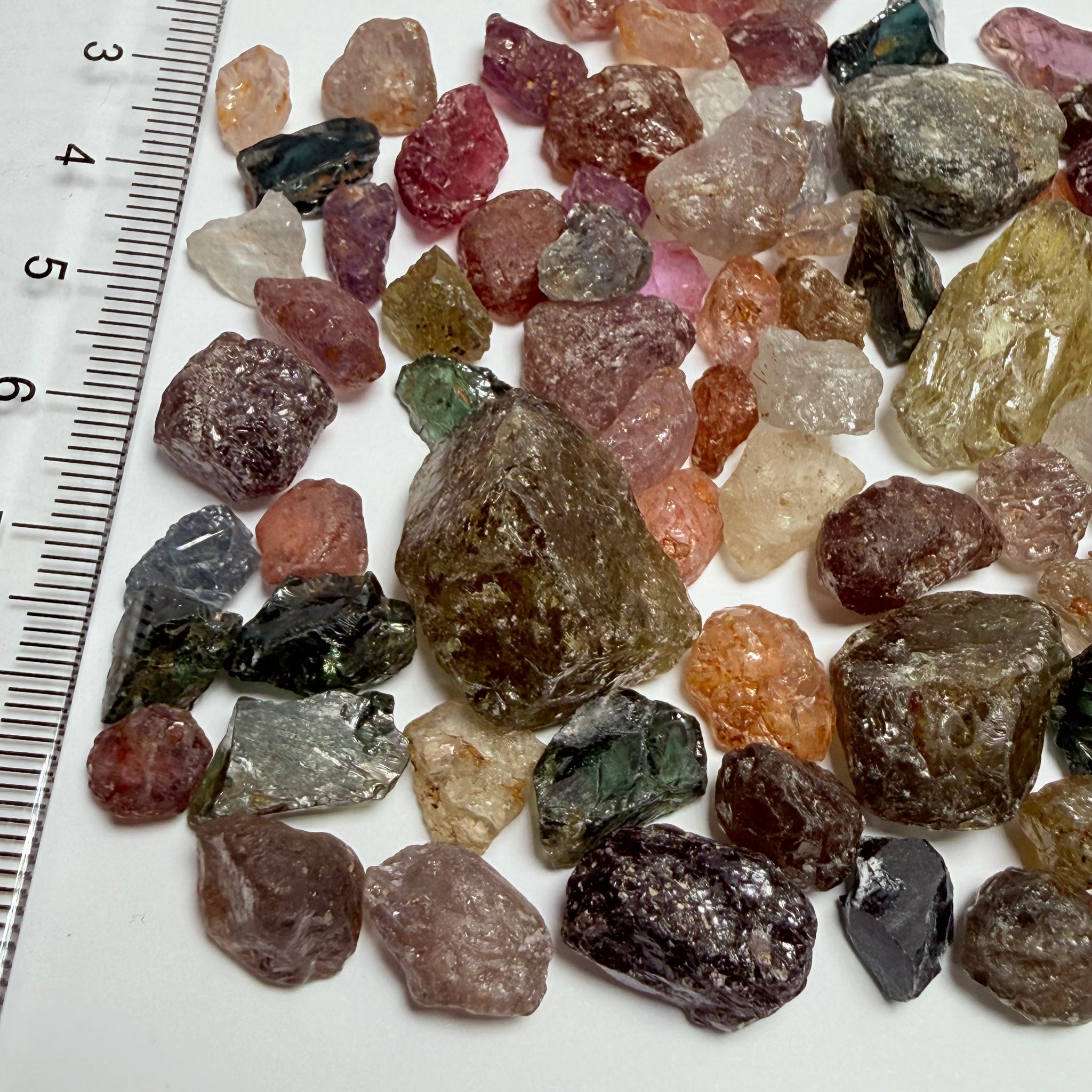 Kenyan and Tanzanian Sapphire mix lot, Slightly included, to included to cabbing grade, an excellent mix, value for money, 94.60gm / 473ct Untreated Unheated, I have included many videos so you get the exact picture