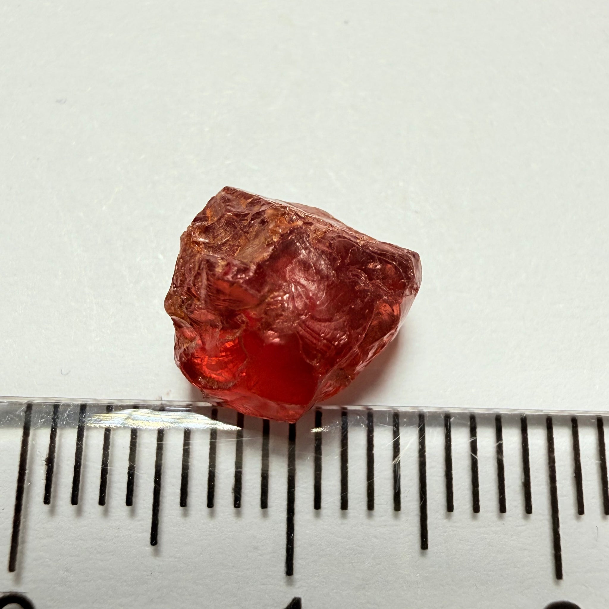 Malaya Garnet, 5.59ct, Tanzania, Untreated Unheated, slight issues on the outside that need to be ground off before faceting, will take off 1/3rd of the stone, rest vvs-if