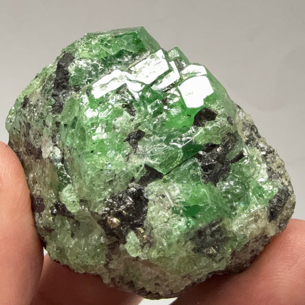 Tsavorite Garnet Crystal with Tanzanite and Pyrite, 94.0gm, Merelani Tanzania, Untreated Unheated.