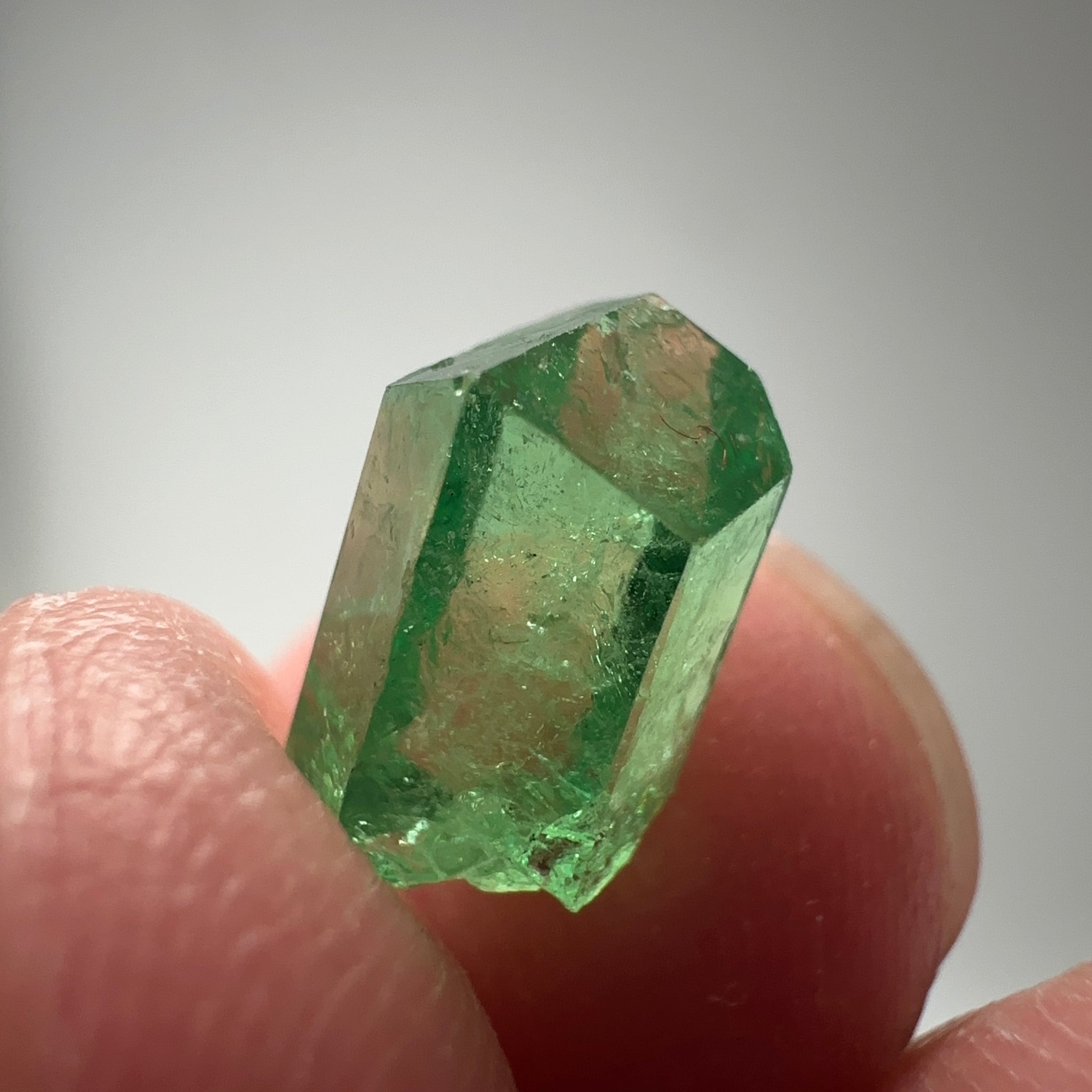 Tsavorite Garnet Crystal, 3.65ct A very unusual Tsavorite crystal from Merelani in Tanzania, Untreated Unheated, see the photos taken in different lights