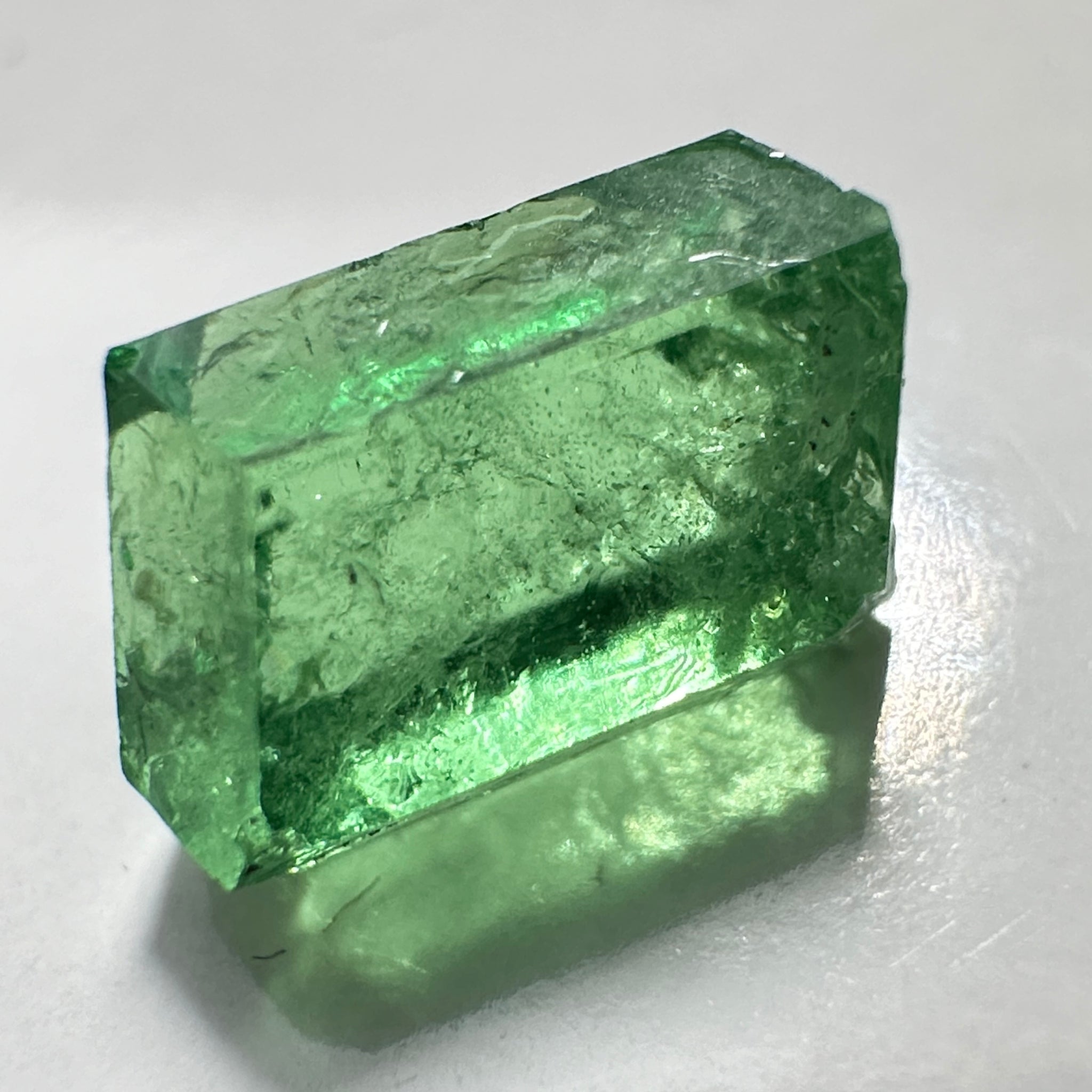 Tsavorite Garnet Crystal, 3.65ct A very unusual Tsavorite crystal from Merelani in Tanzania, Untreated Unheated, see the photos taken in different lights