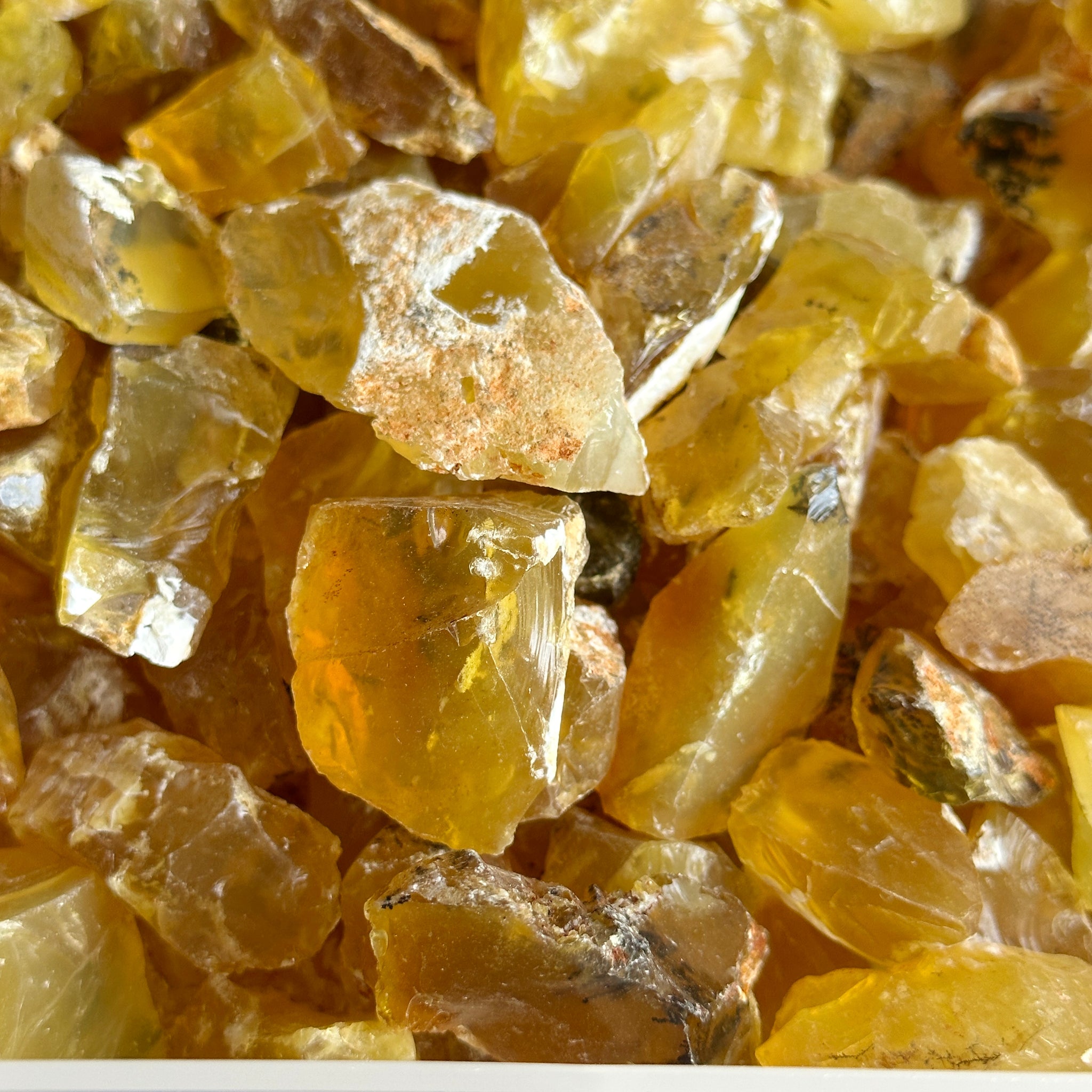 Honey Opal, Kigoma, Tanzania, 1 Kilo Bag, great for cabbing and faceting, (see close-ups in photos), polishes really well, if you want to see how polished cabs from this material looks reach out, also good for retailing and selling at shows