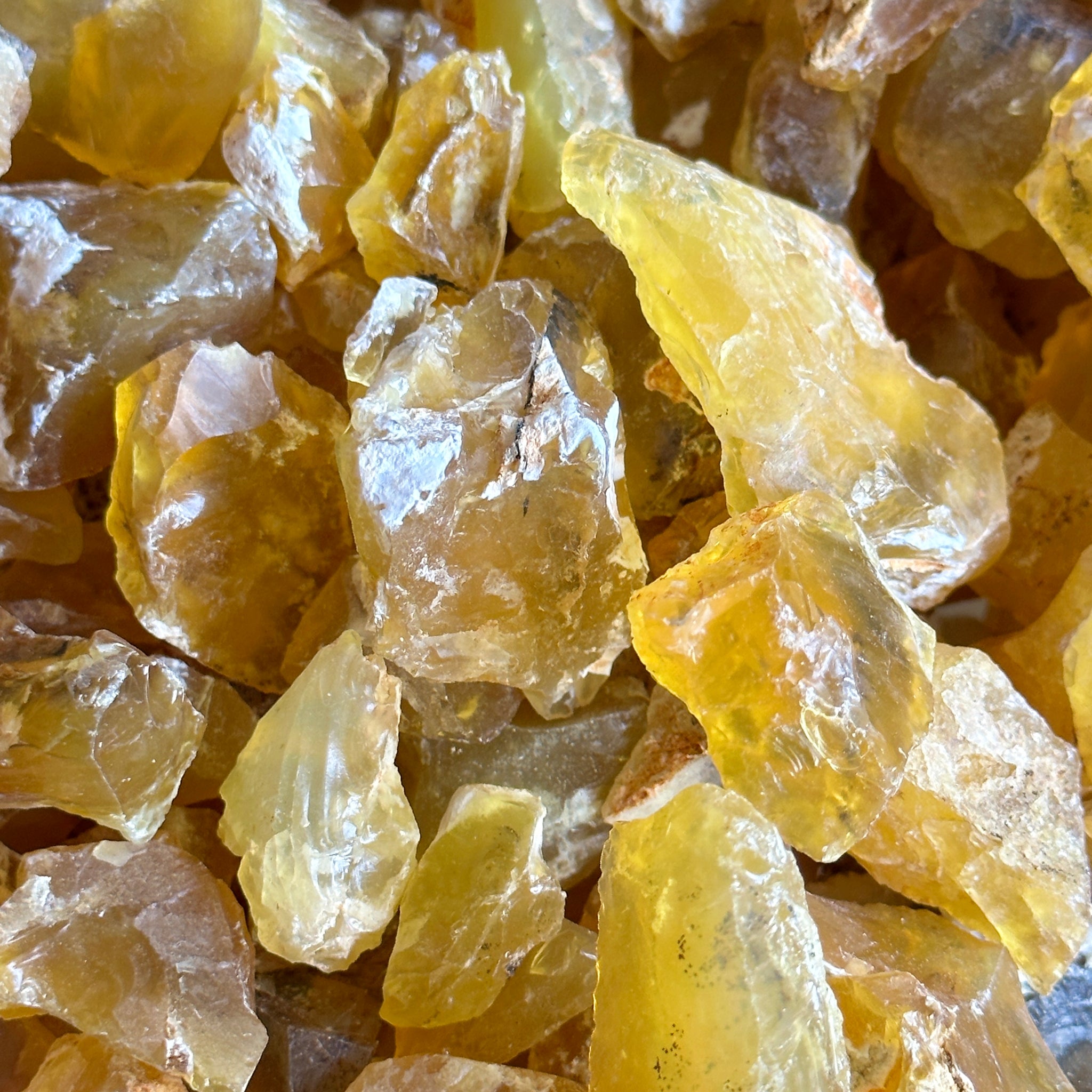Honey Opal, Kigoma, Tanzania, 1 Kilo Bag, great for cabbing and faceting, (see close-ups in photos), polishes really well, if you want to see how polished cabs from this material looks reach out, also good for retailing and selling at shows