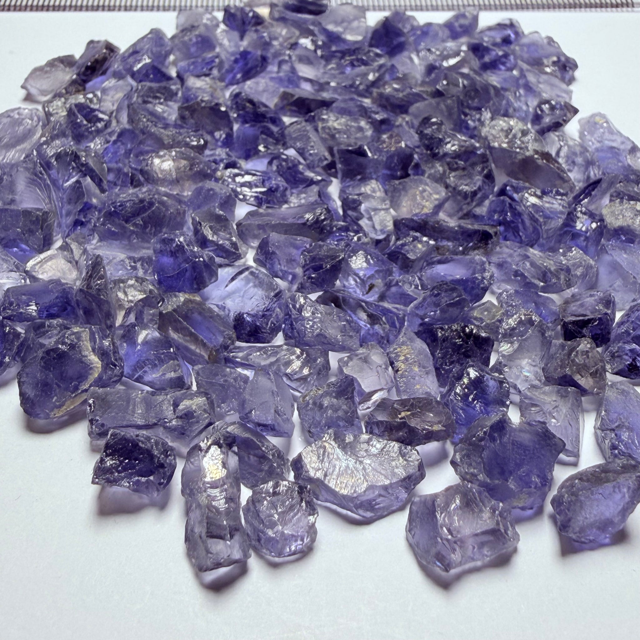 Iolite Lot, 64.70gm / 323.50ct, Babati, Tanzania, Untreated Unheated, 2.20ct average. Most are eye clean and better, a few have inclusions, many flat shapes