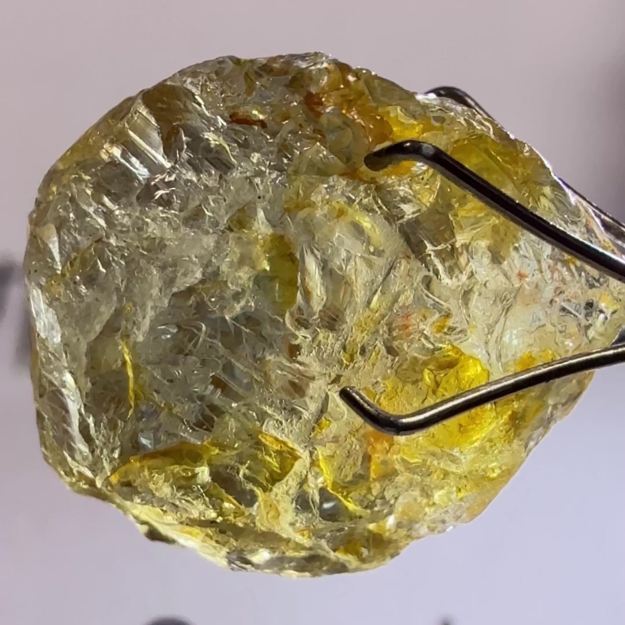 Umba Sapphire, 14.22ct, Umba Valley, Tanzania, Untreated Unheated. Very slight inclusion on the outside skin that will need to be removed before faceting, rest are needles, see videos backlit
