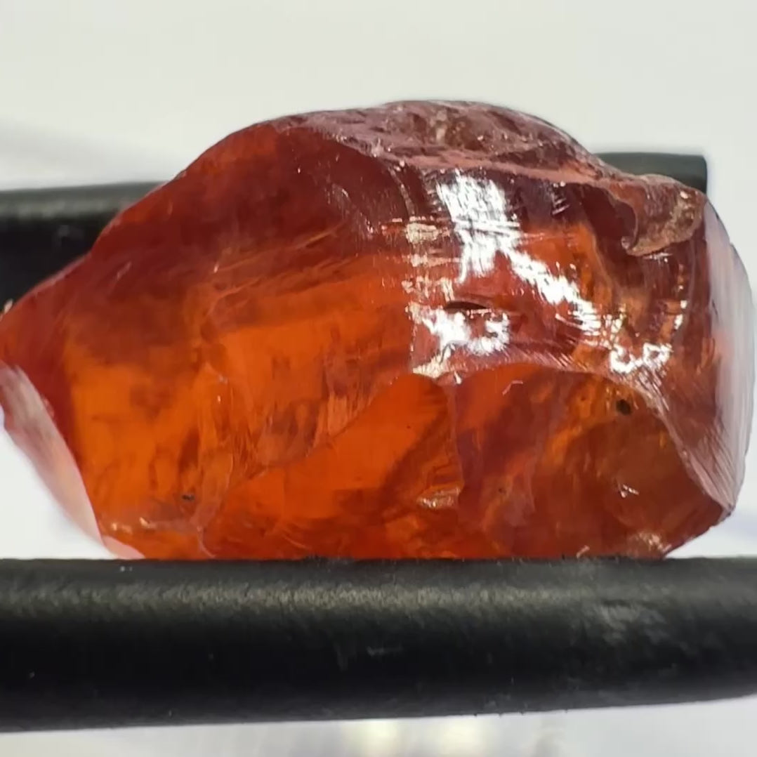 Malaya Garnet, 12.25ct, Super rare size, Tanzania, Untreated Unheated. Just faint parallel silk lines, I have backlit some photos so you can see the silk cannot be seen by the naked eye, very vivid bright colour